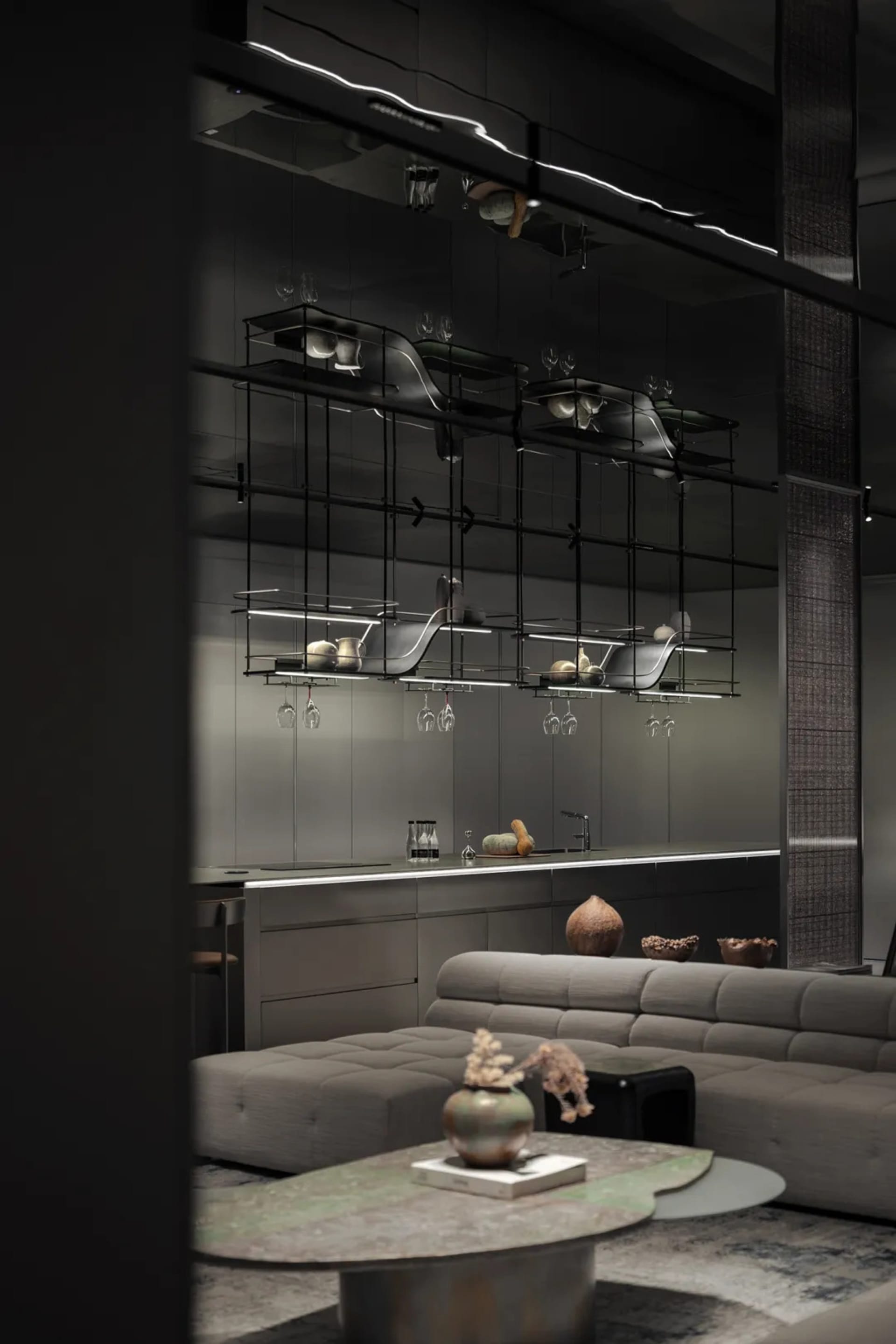 Modern minimalist kitchen featuring black metal accents and lighting