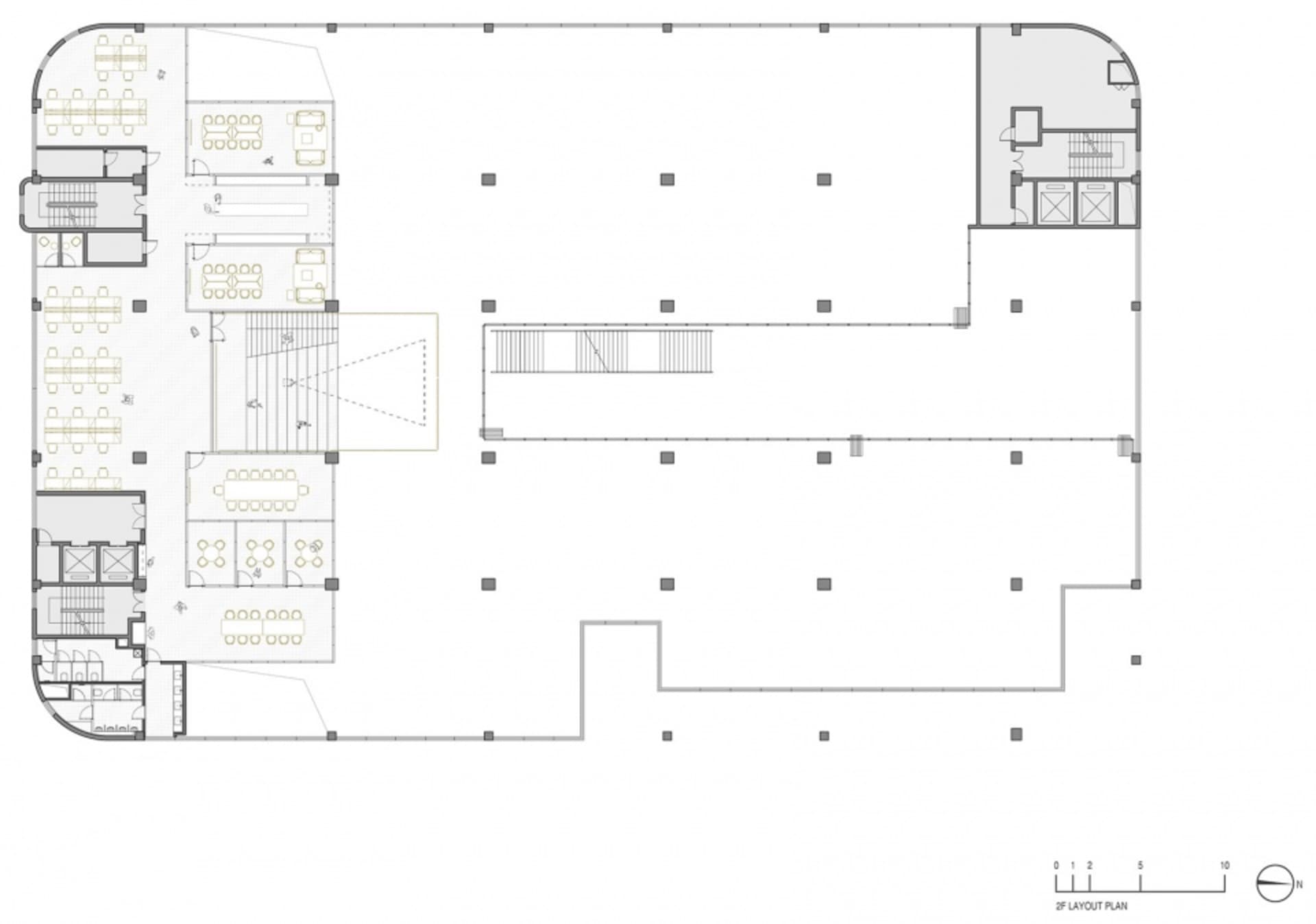 Floor plan of an office layout with various workstations and conference rooms.