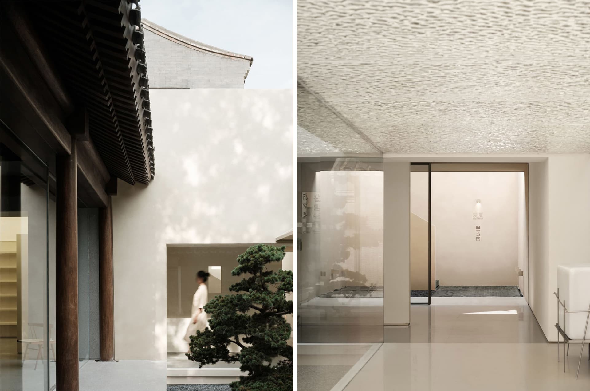 Modern interior space with glass walls and concrete floor.