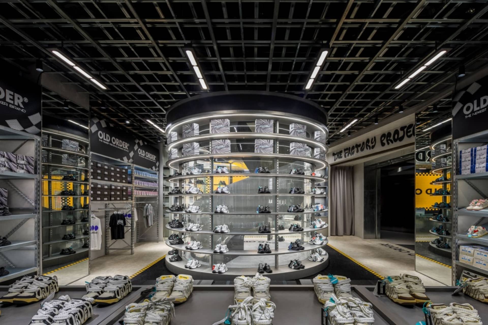 Retail store with industrial design featuring metal and glass elements.