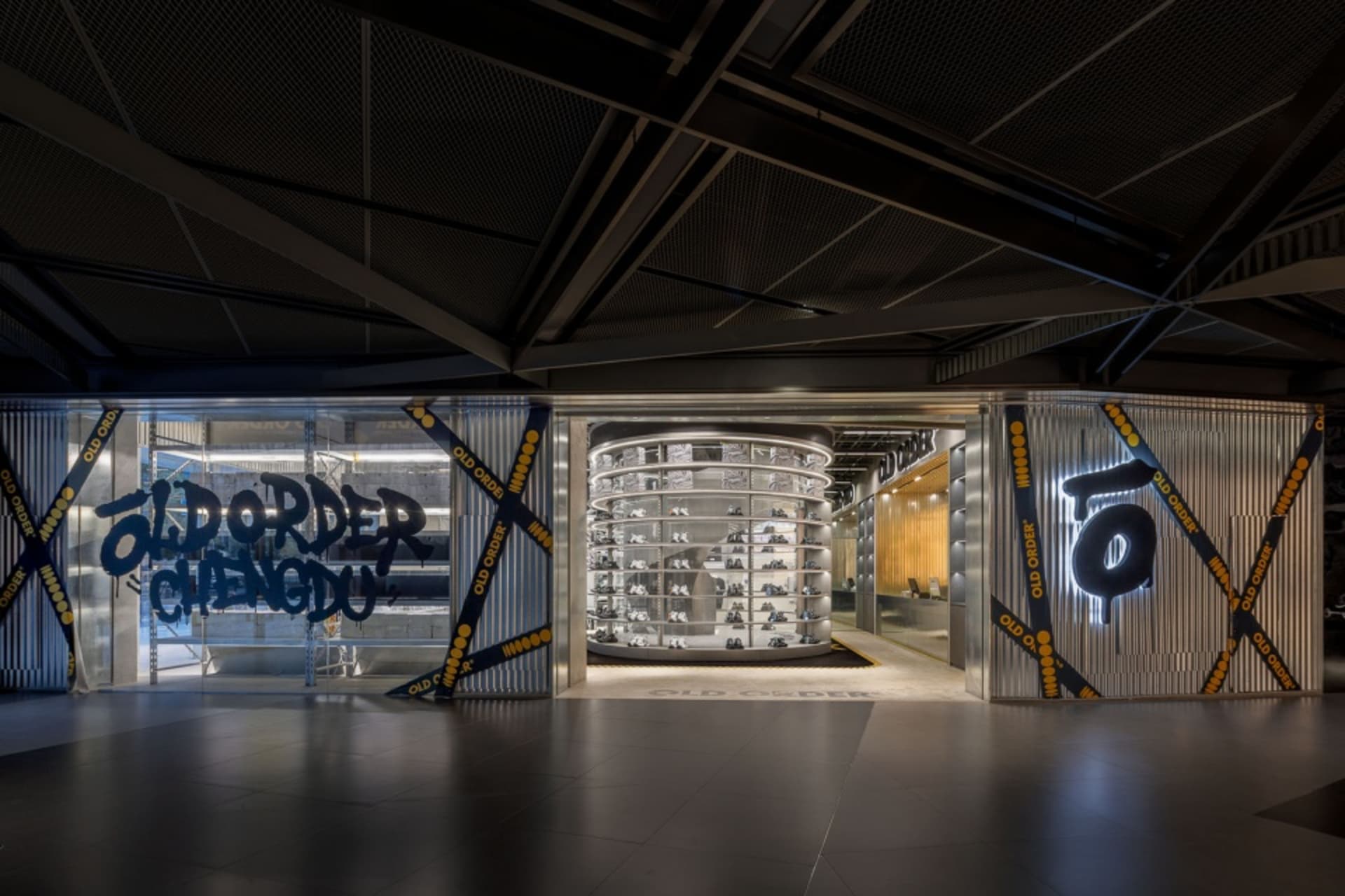 A modern retail shoe store featuring metal and glass elements.