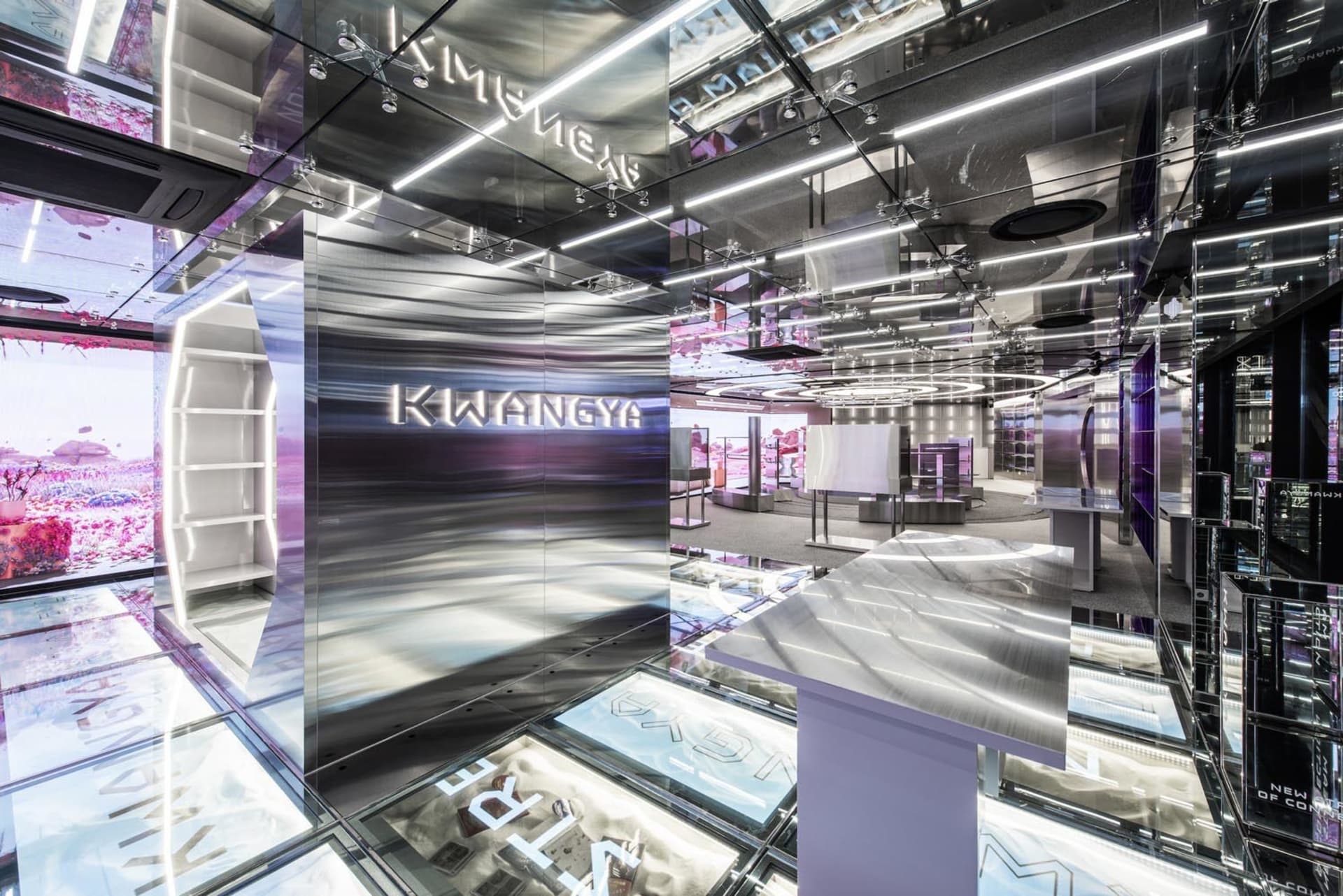 A modern retail storefront featuring glass and metal composite materials.