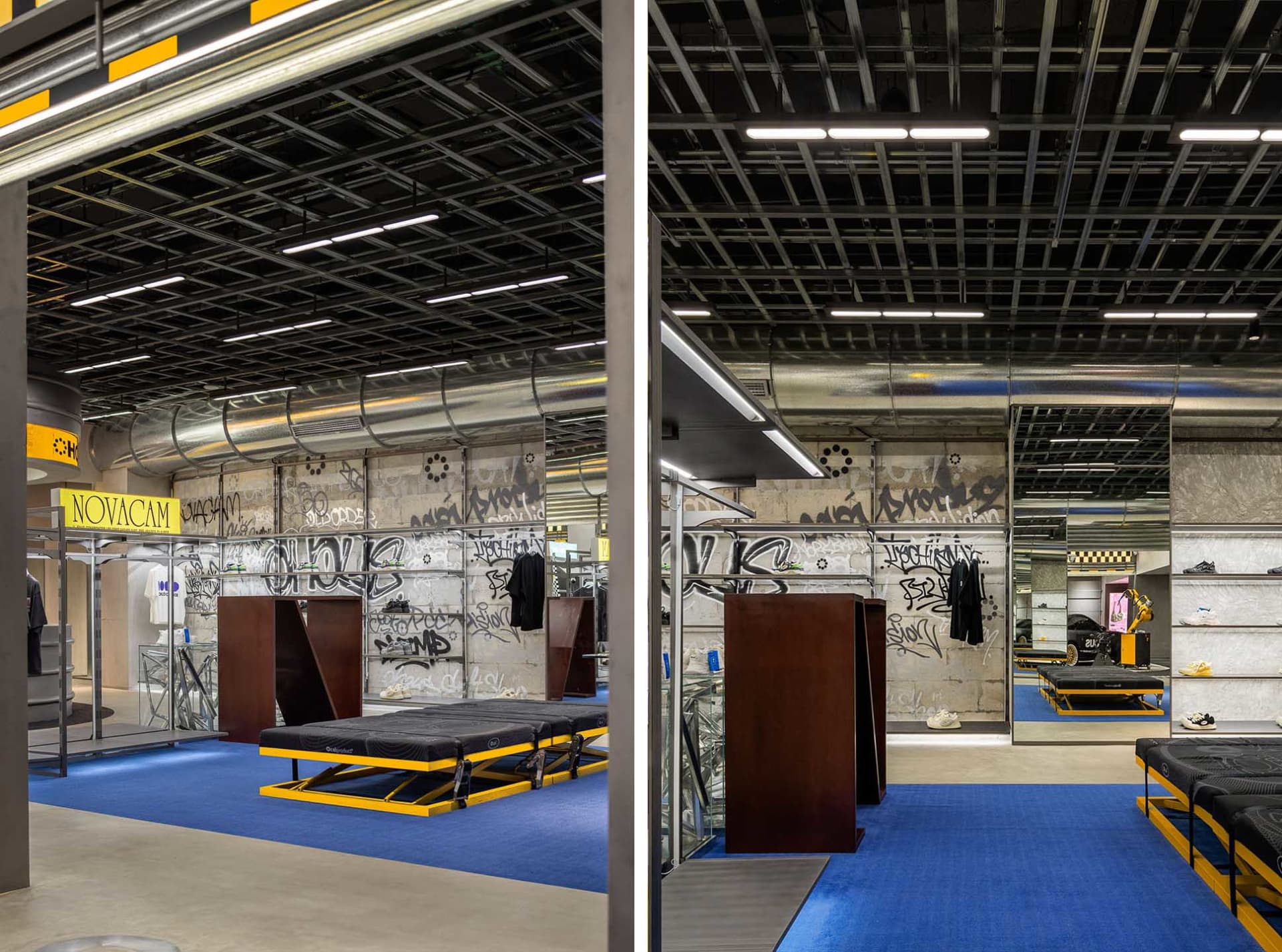 Industrial retail storefront with concrete walls and metal accents, featuring graffiti art.