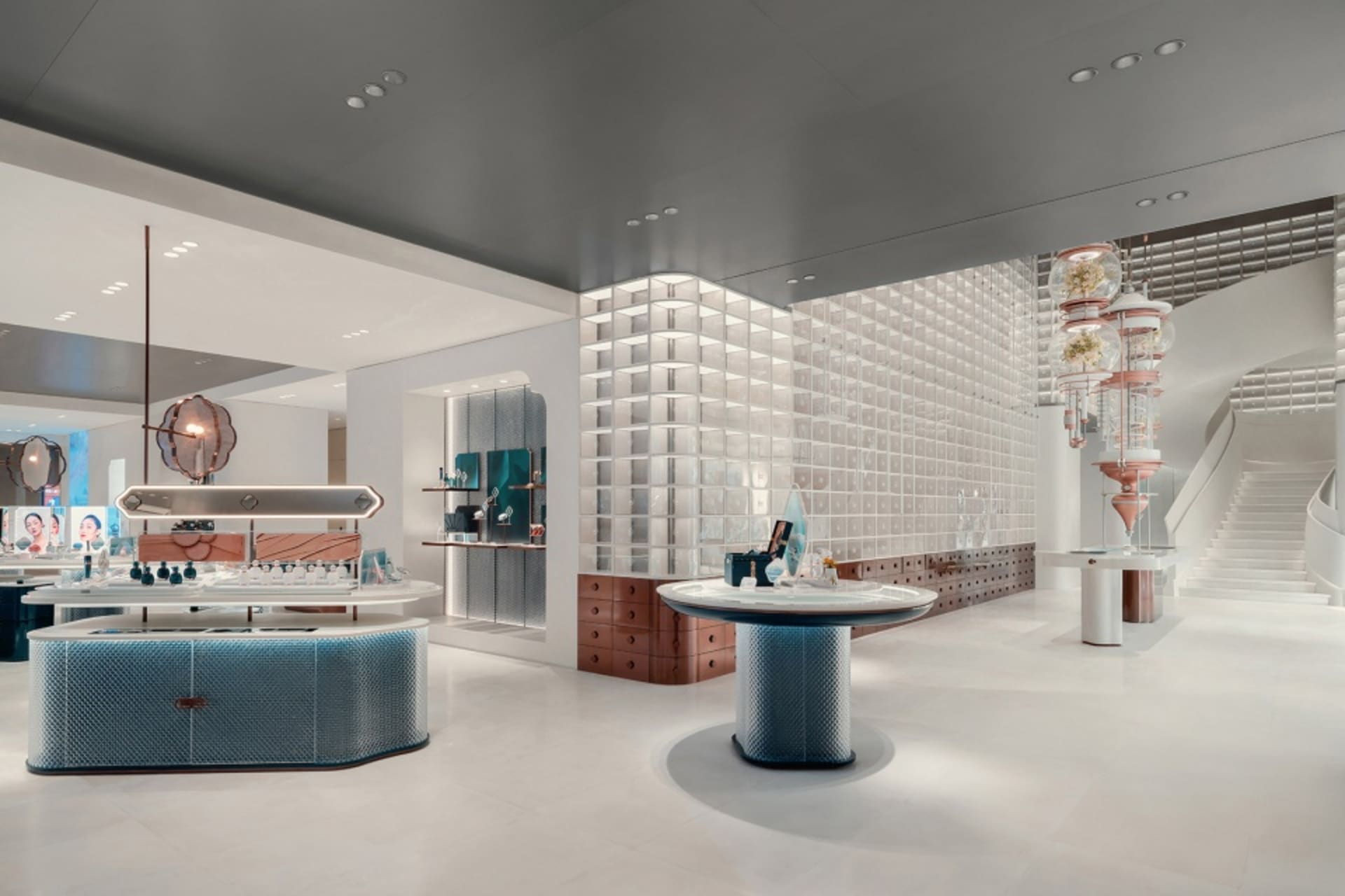 Modern retail storefront with metal accents and glass elements.