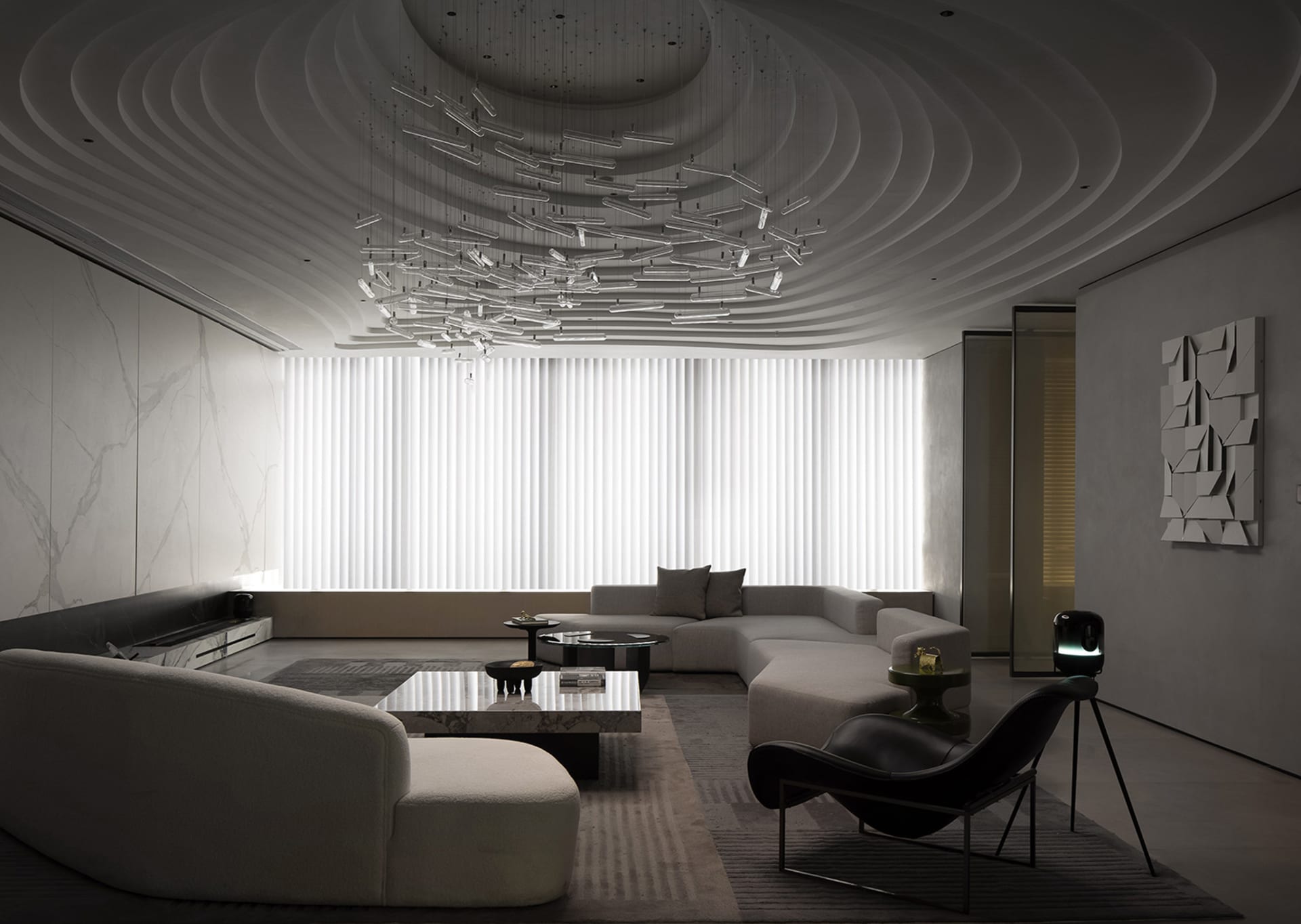 Modern living room featuring a fabric sofa, stone coffee table, and metal accents.