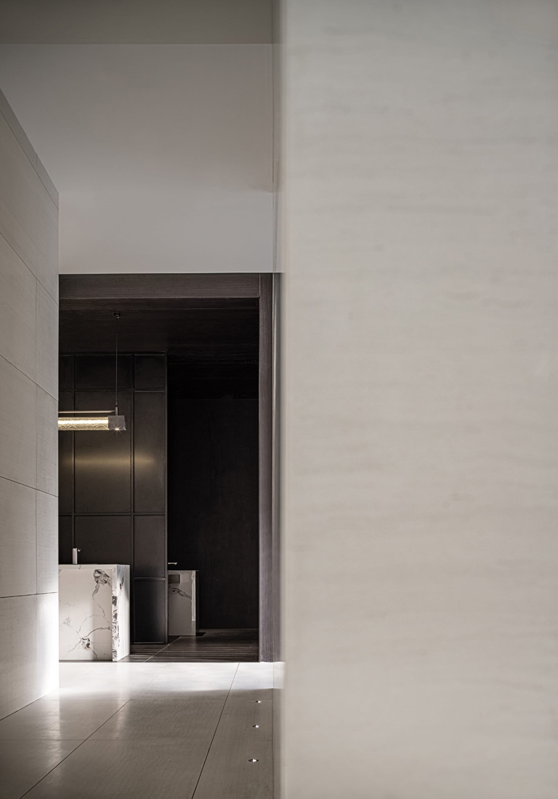 Minimalist modern interior with white minimalist furniture and clean lines.