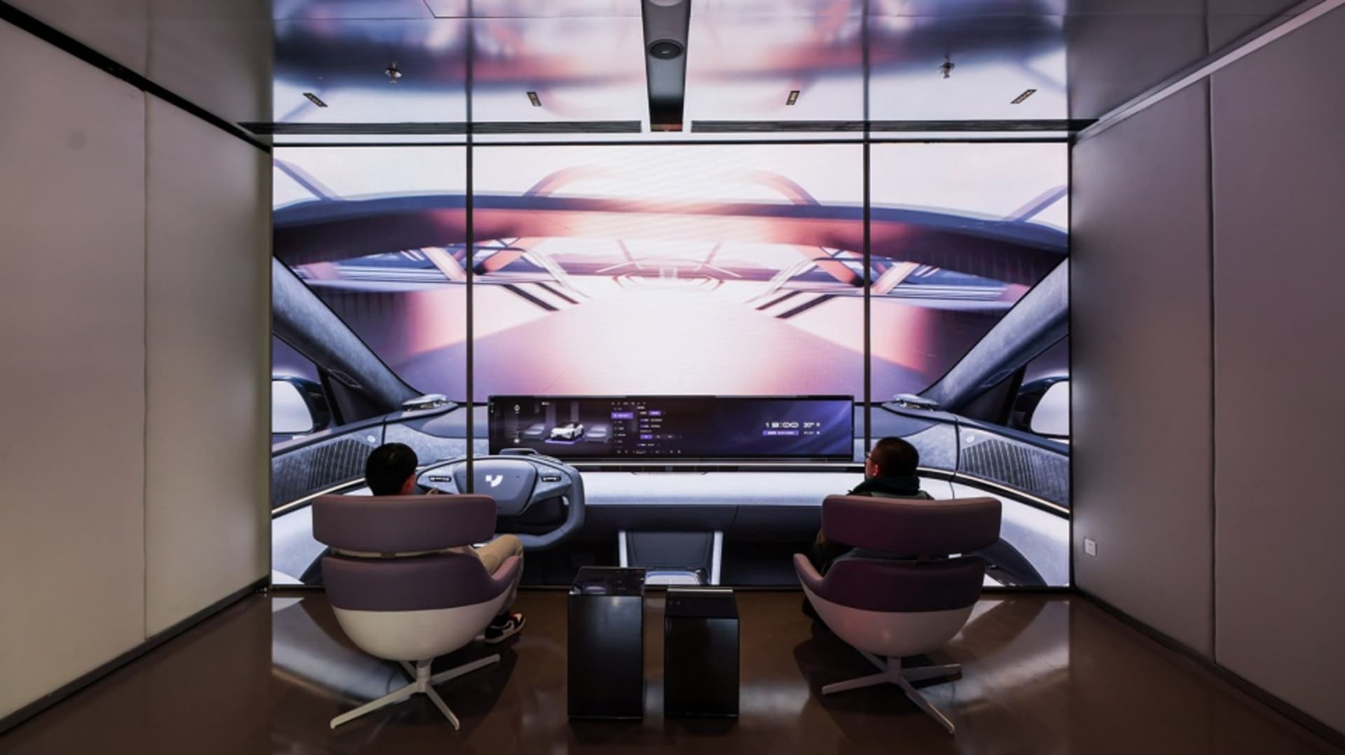 Two people sitting in a modern automotive interior design rendering, showcasing futuristic and minimalist aesthetics.