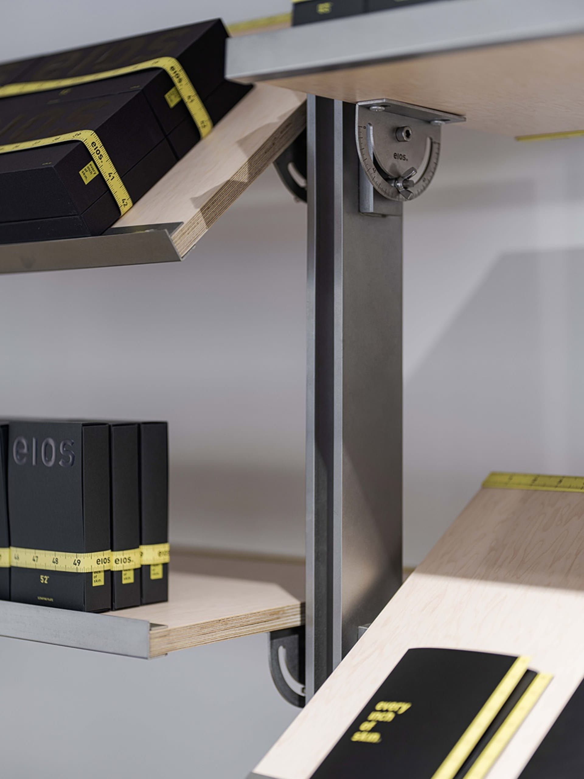 Industrial-style metal shelves with adjustable levels and measurement tape