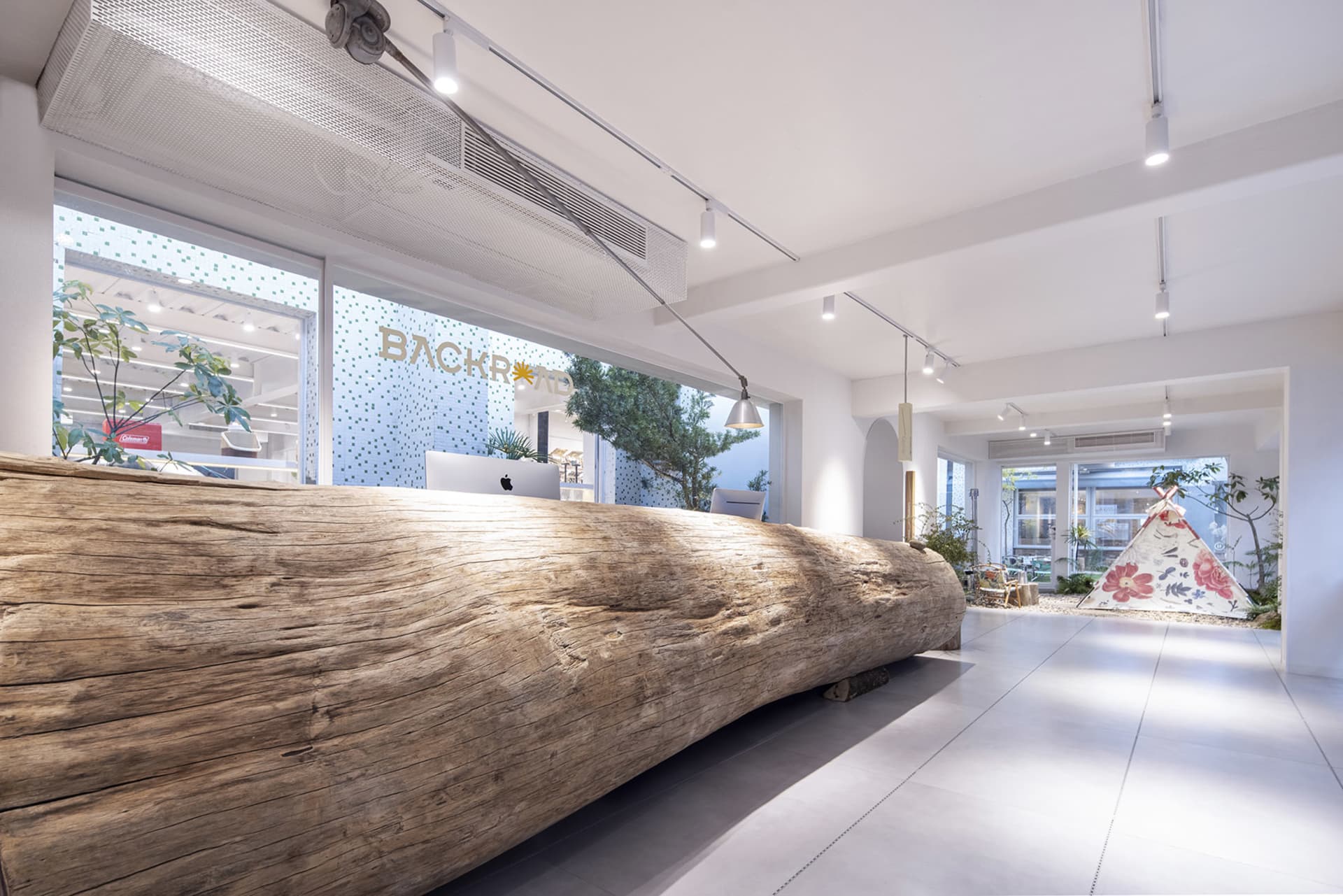 Industrial design interior featuring rustic wooden and concrete elements.