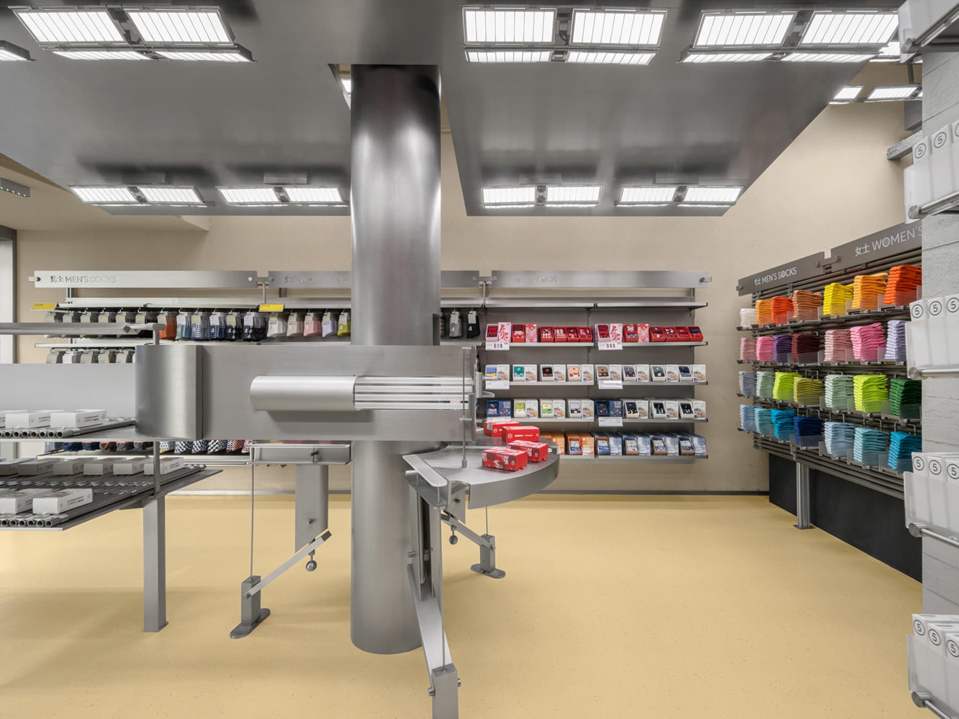 Interior of an industrial retail store featuring metal and plastic displays.