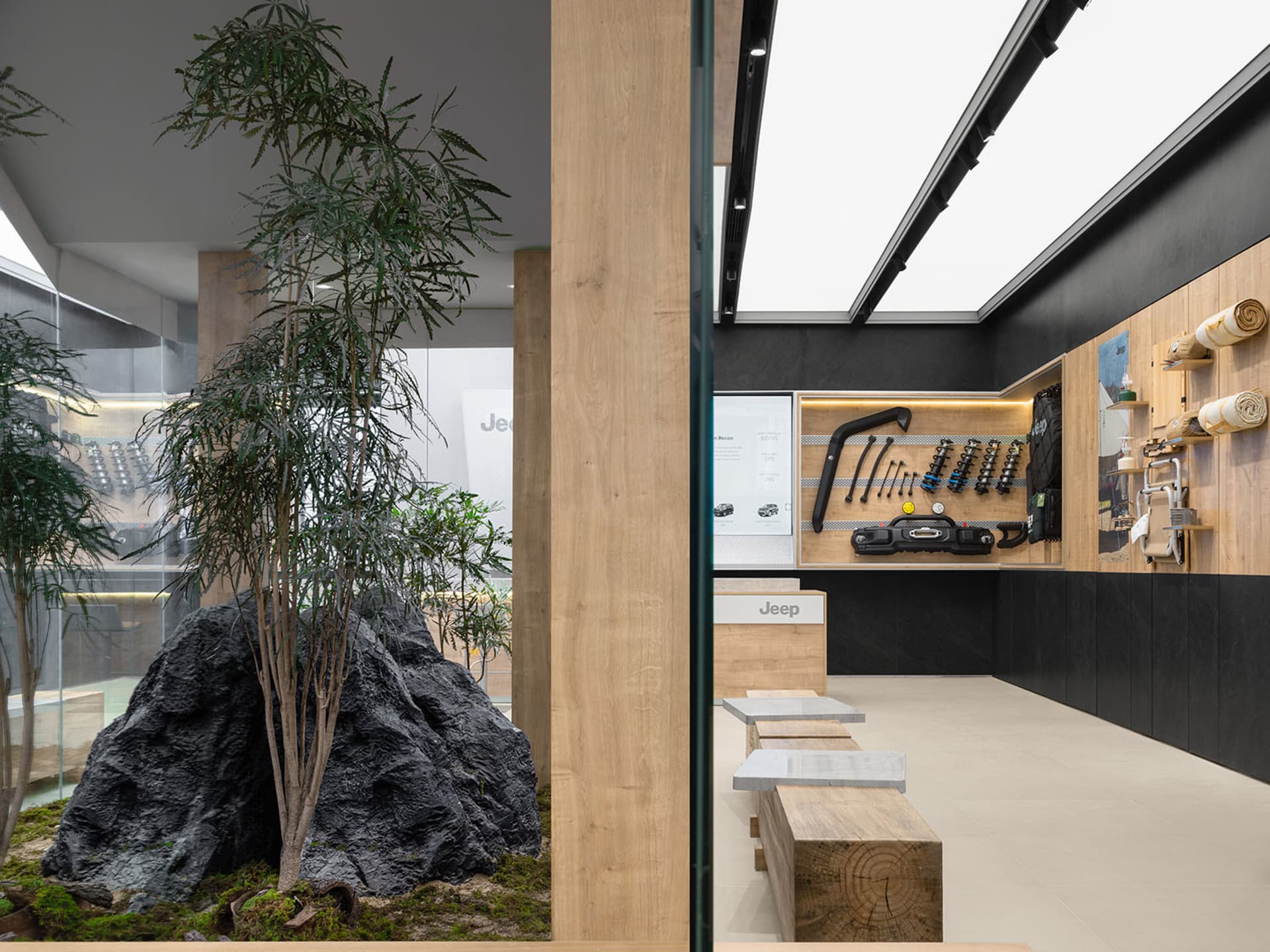 An industrial-themed automotive showroom featuring wood and concrete materials.