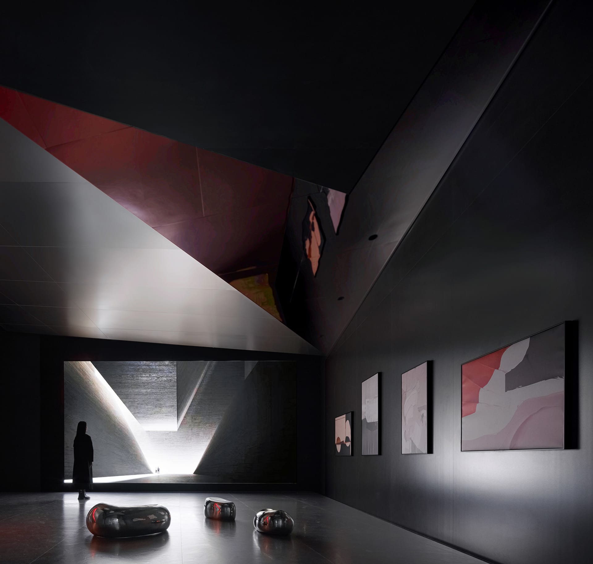 A modern interior design of a lobby with concrete walls and a high ceiling.