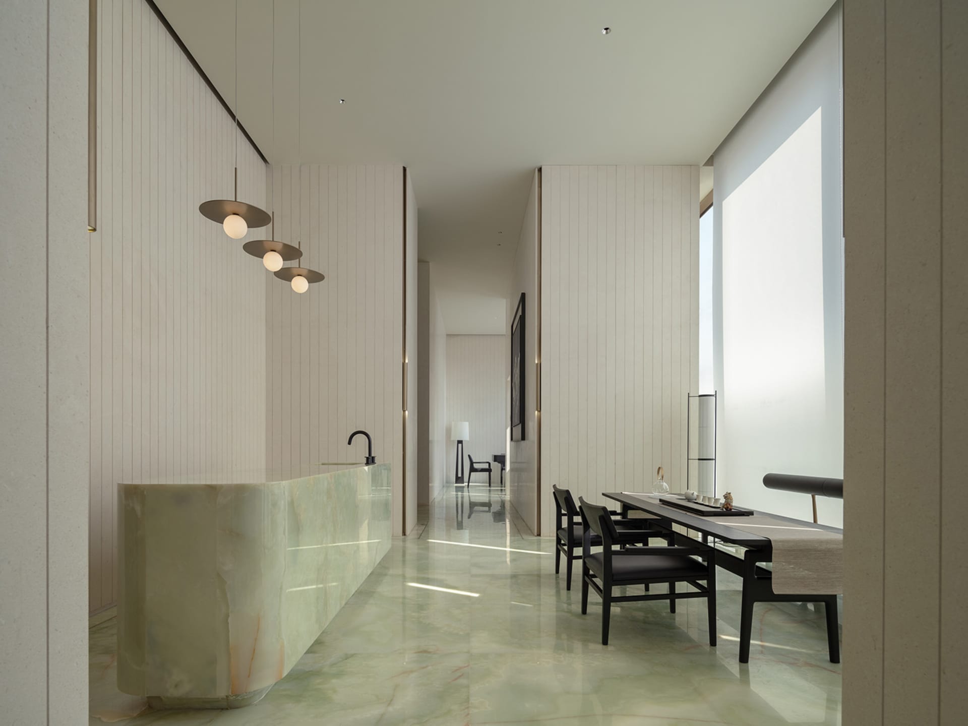 Modern residence featuring marble flooring and minimalist design.