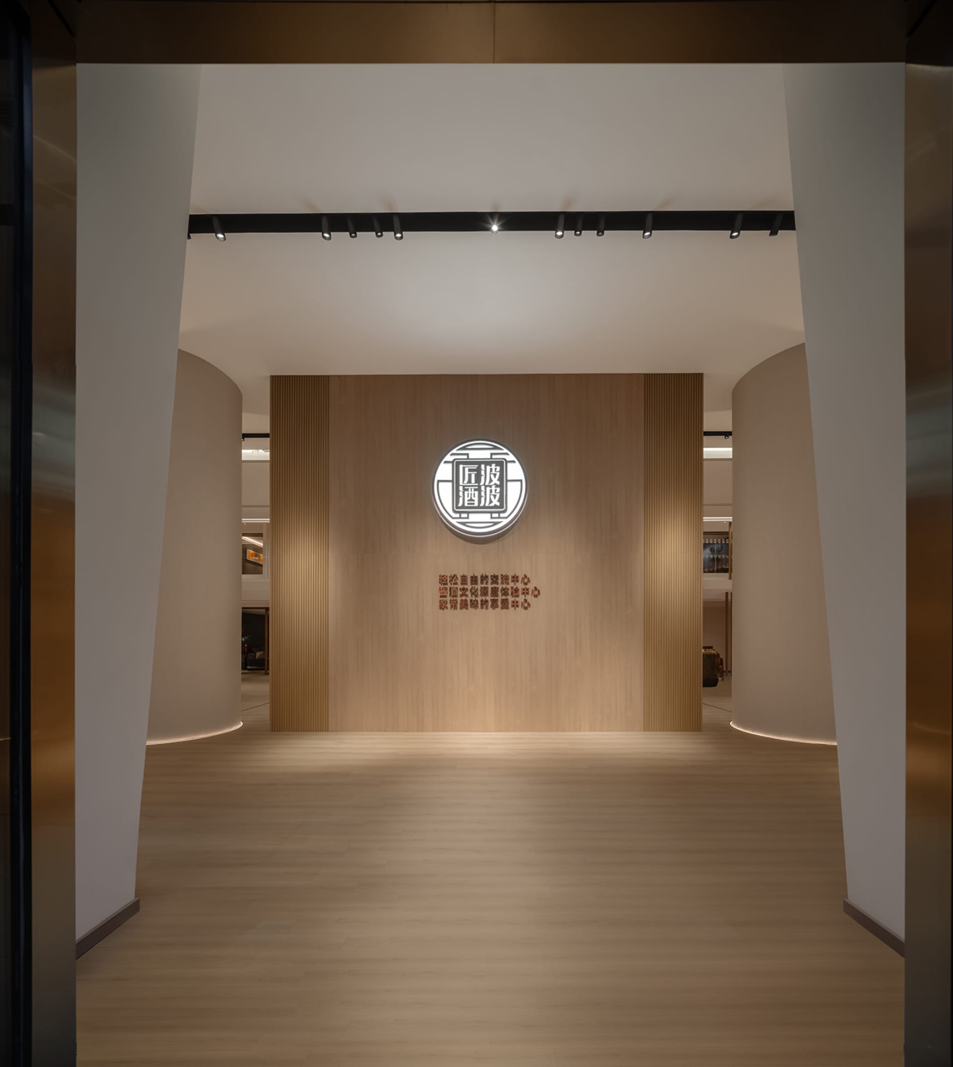 A welcoming indoor entryway designed in a modern style with wooden materials