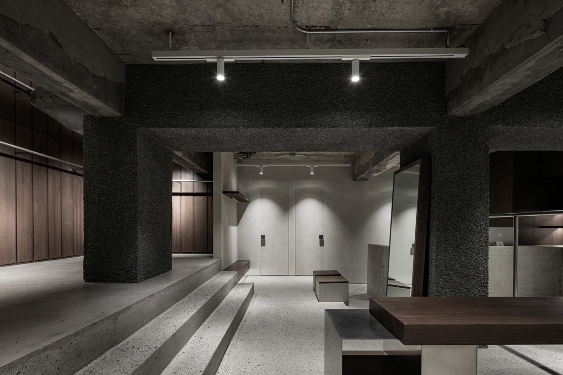 Concrete storefront featuring contemporary design elements.