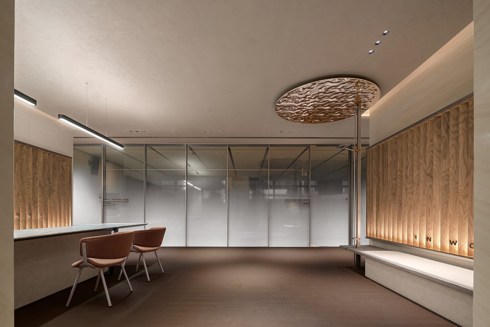 A modern reception area featuring a clean, minimalist design with natural wood accents.