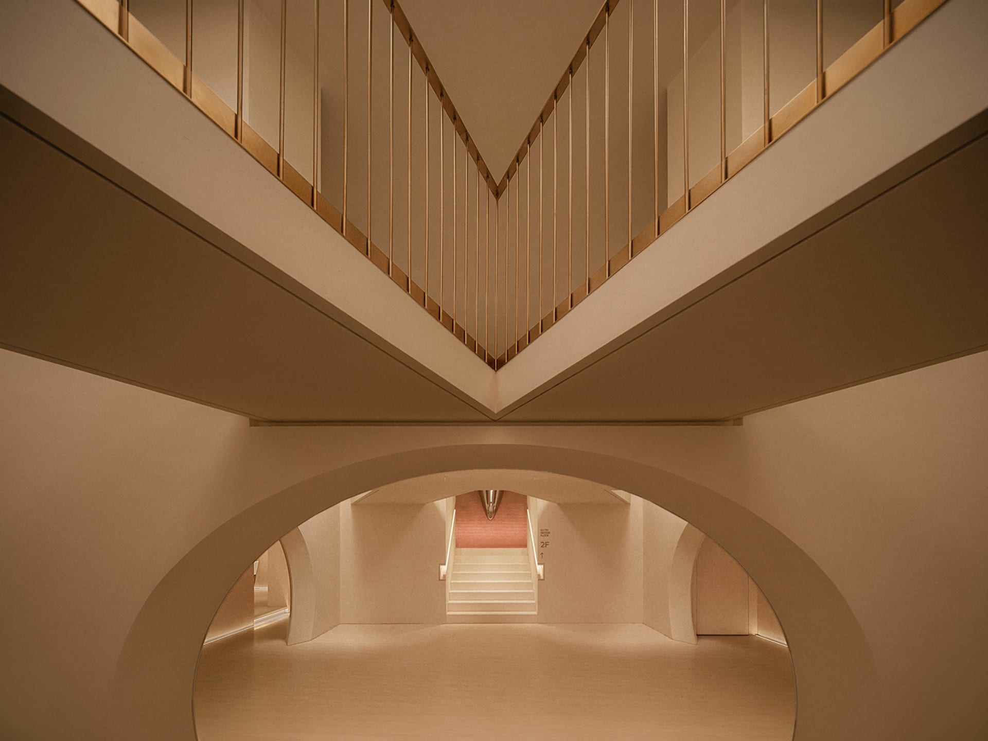 Concrete staircase intersection with minimalist design and clean lines.