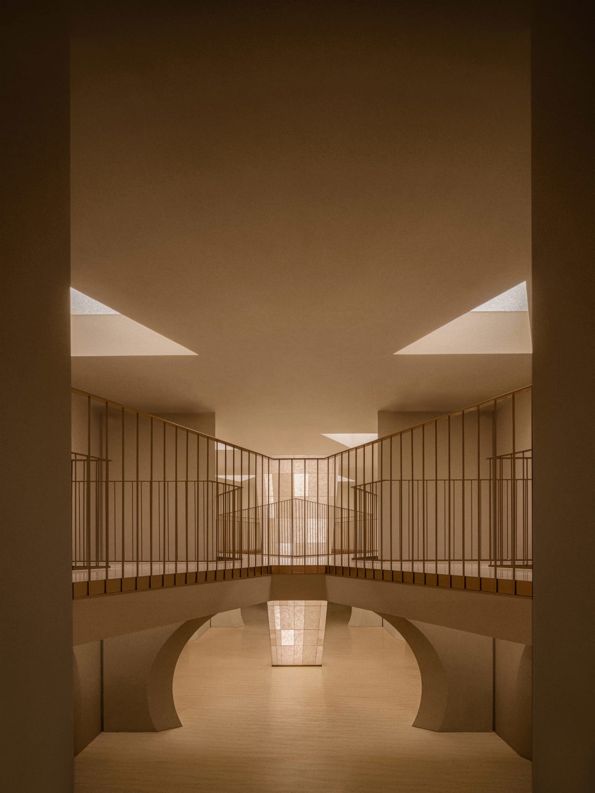 A minimalist interior space featuring minimalist concrete architecture with natural light entering through skylights.