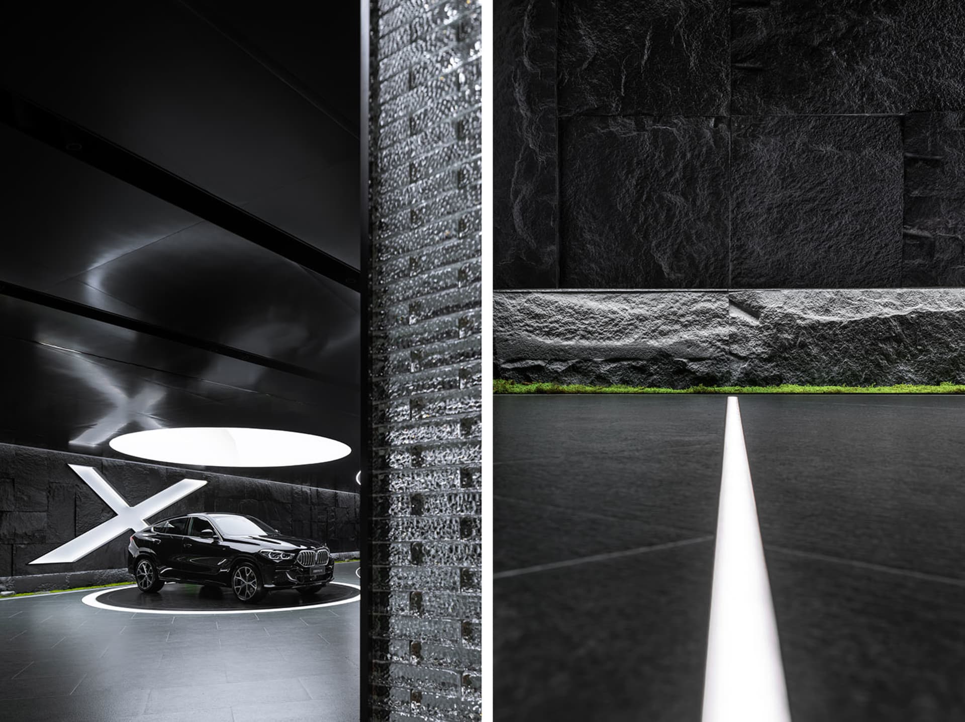 A sleek, minimalist showroom interior featuring a black vehicle displayed on a circular platform with lighting and black mate
