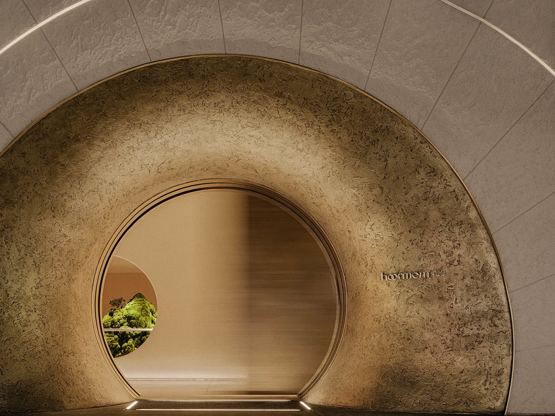 A modern lounge area with a textured concrete wall.