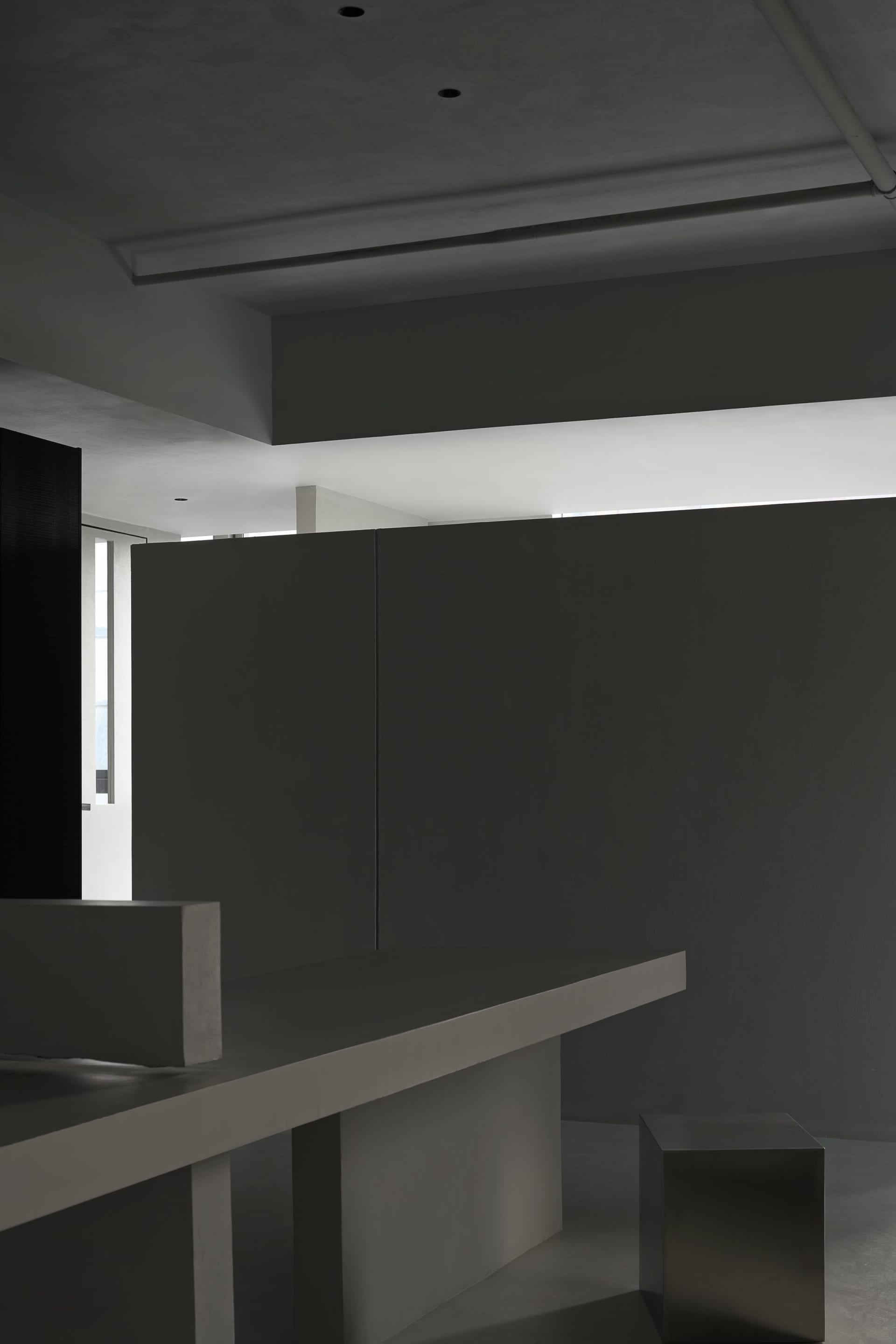 Minimalist office interior with concrete walls and modern design