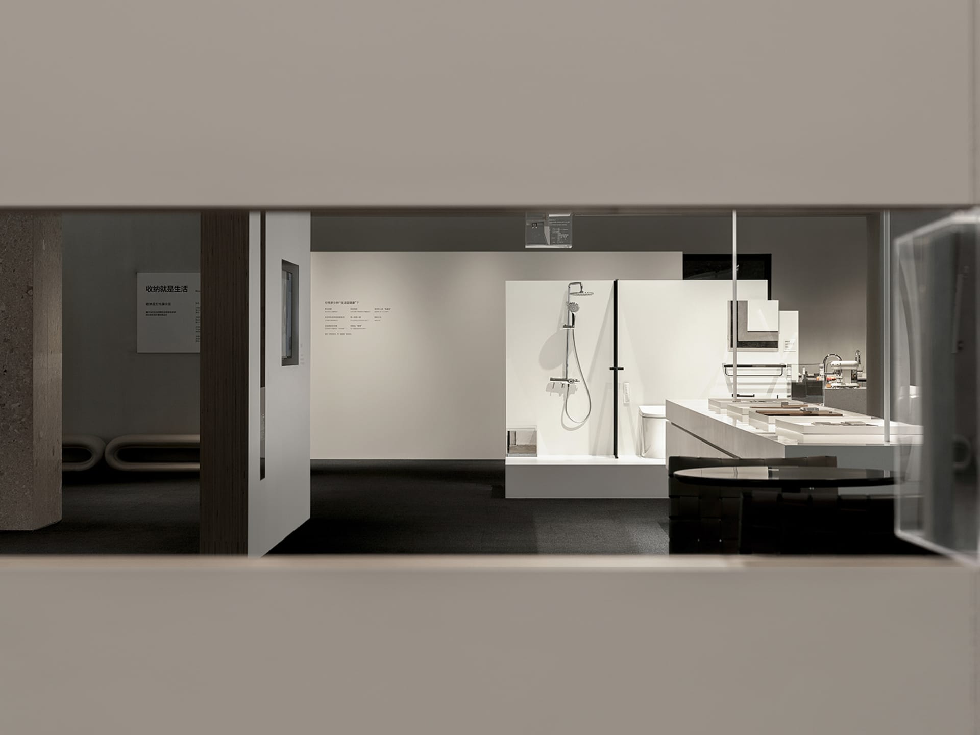 A modern kitchen with a white countertop, stainless steel appliances, and minimalist design.
