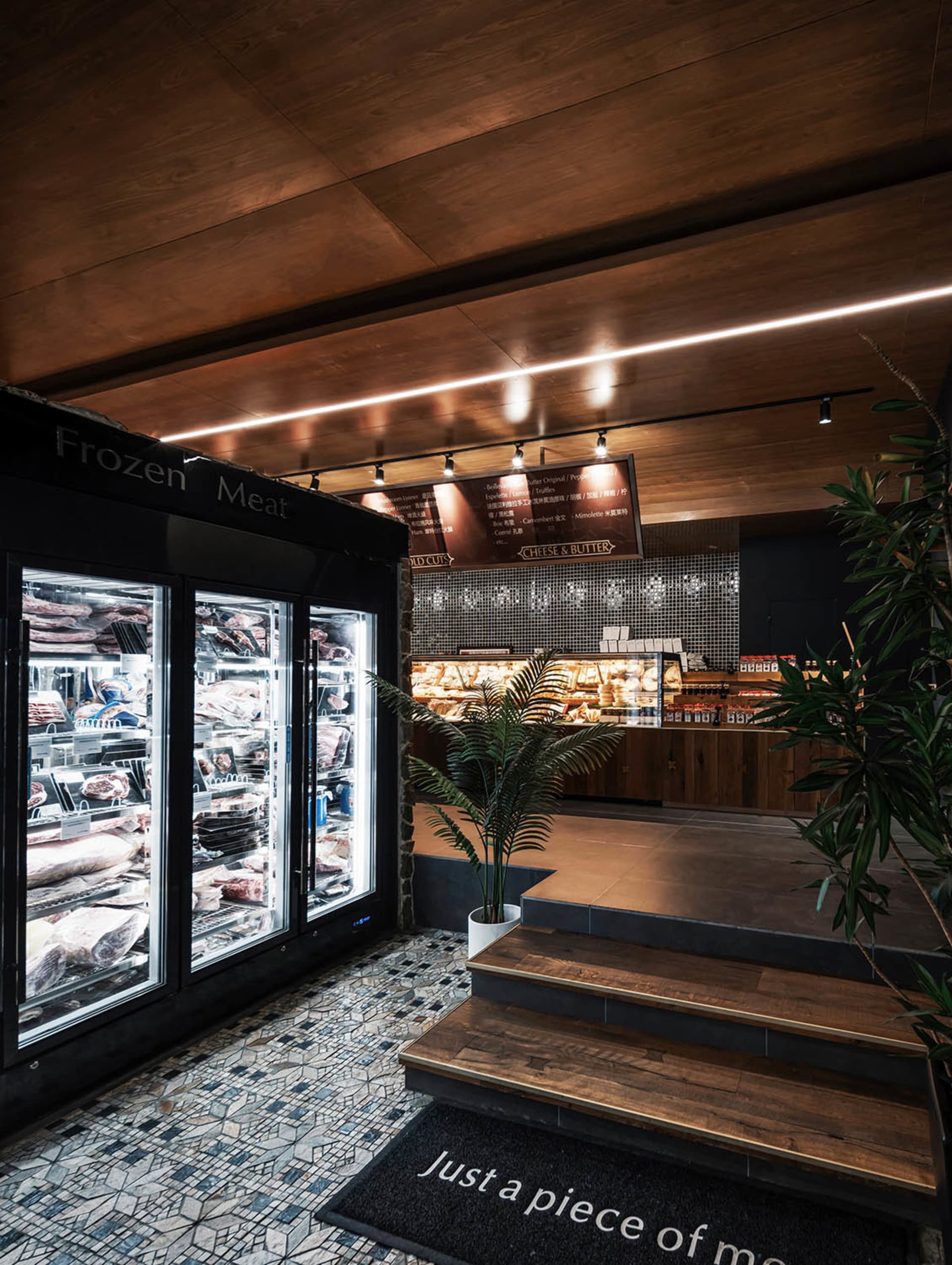 A modern retail space featuring a combination of wood, glass, and tile materials.