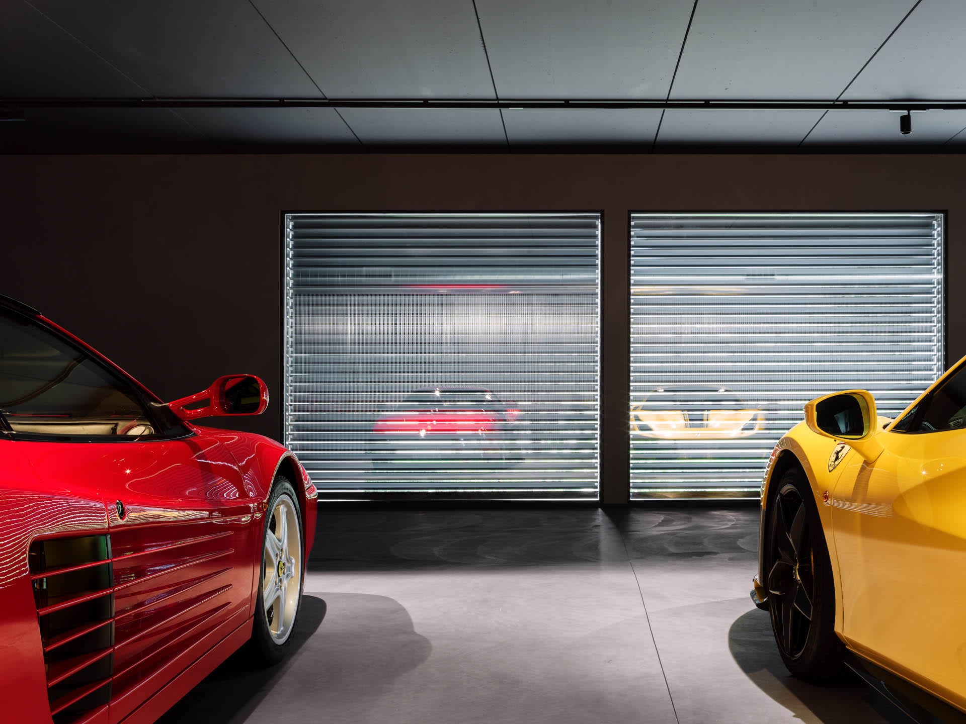 Ferrari showroom with metallic interior design.