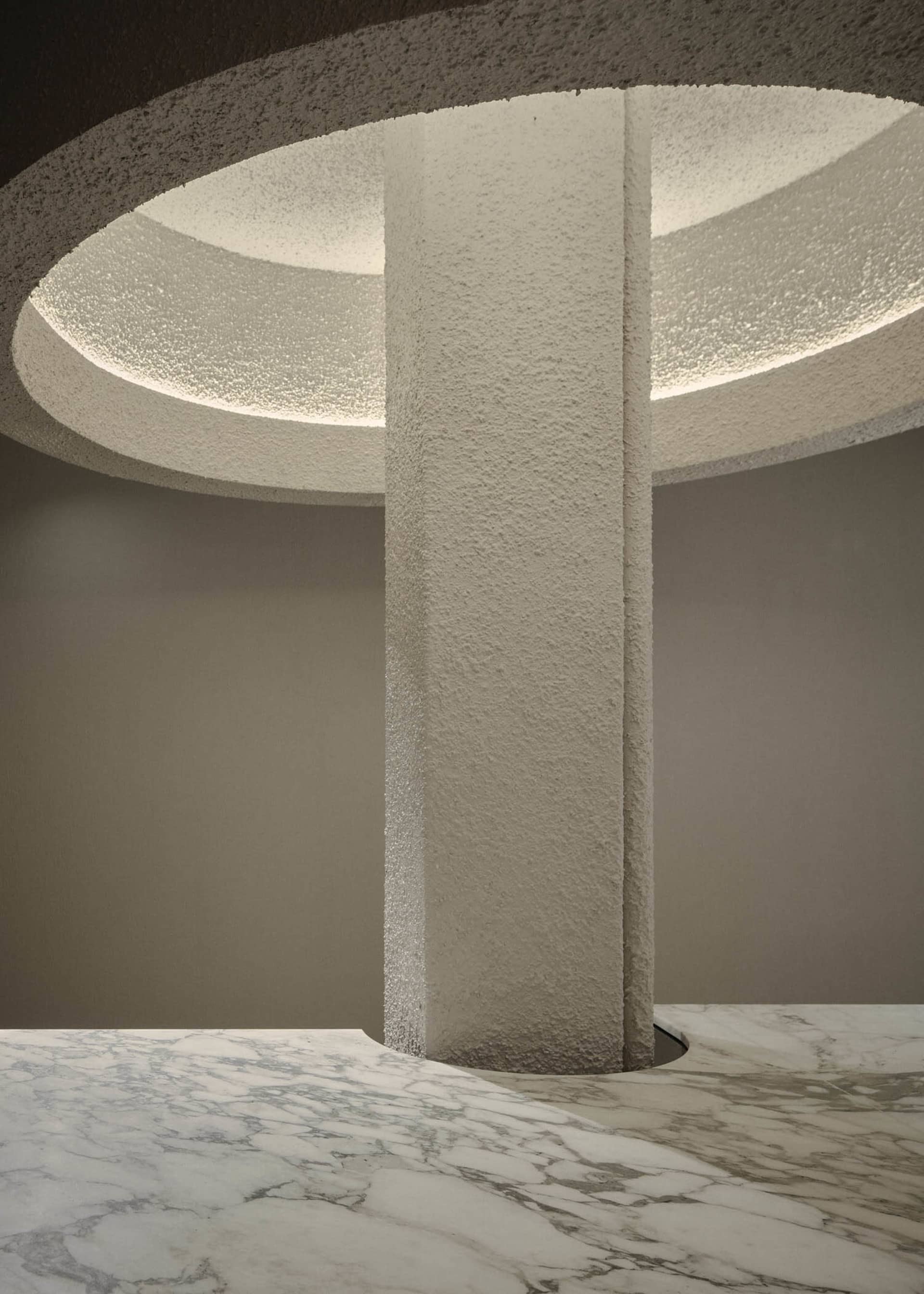 Modern design featuring marble materials in an interior setting.
