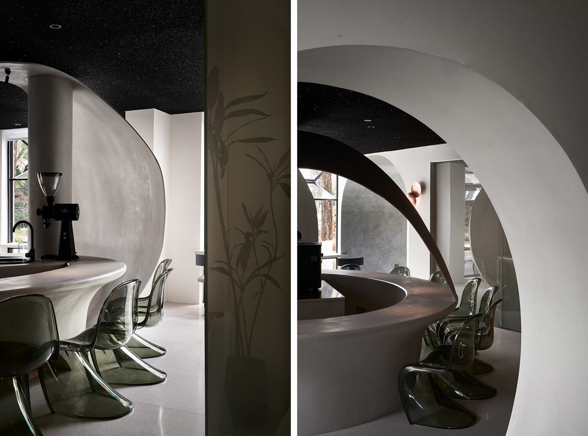 A modern coffee shop with a concrete counter and transparent chairs.