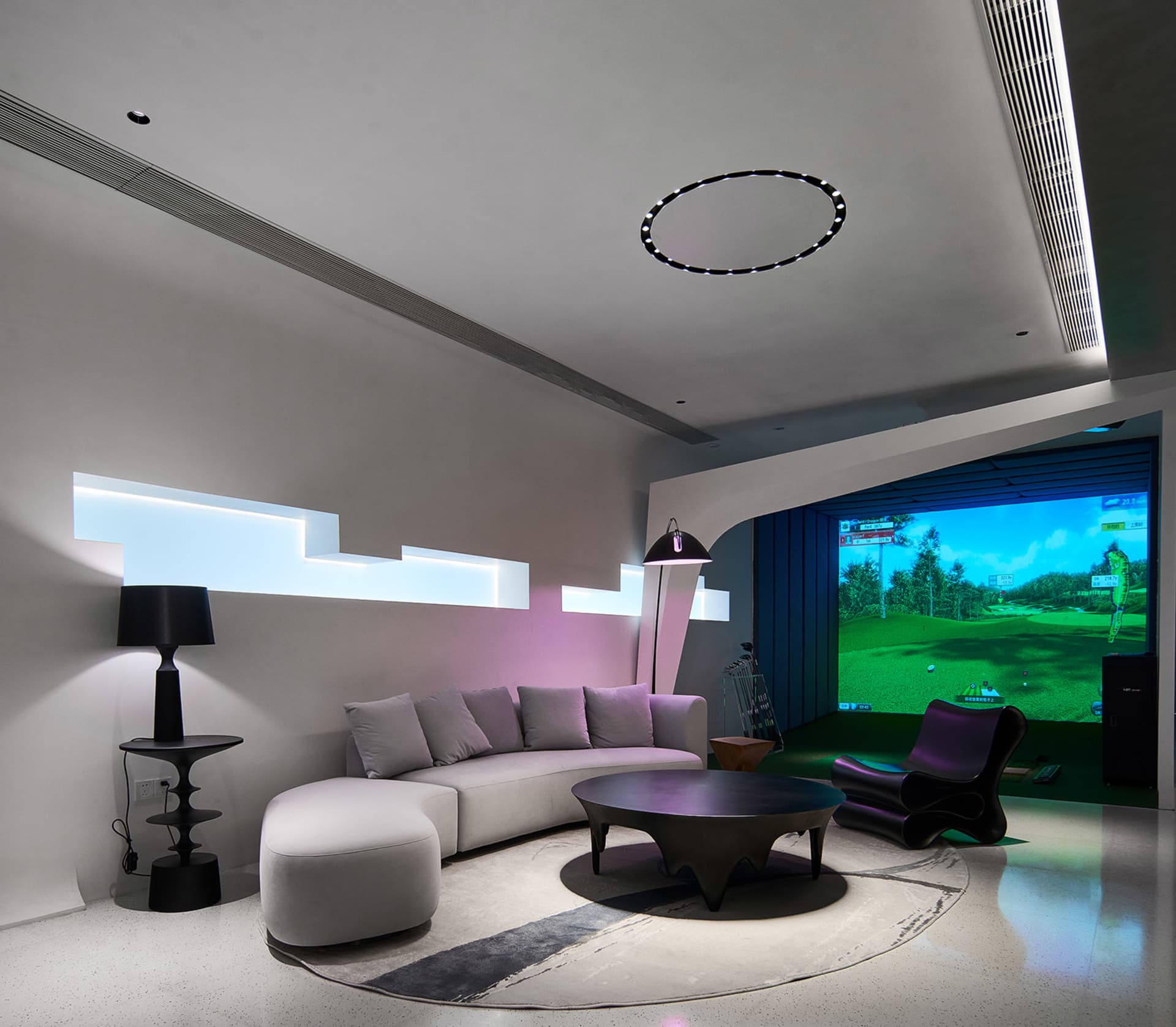 A modern living room featuring floor lamps and contemporary furniture