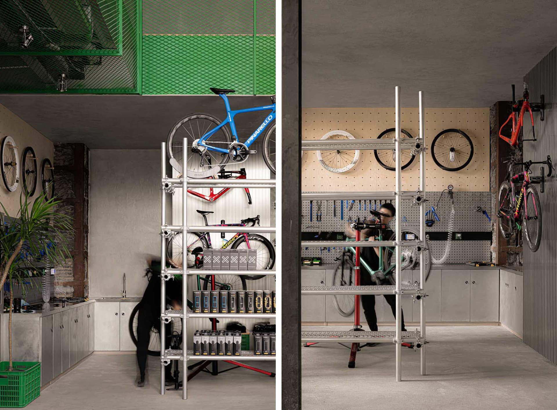 A workshop with metal shelves, bicycle parts, and people working on bikes.