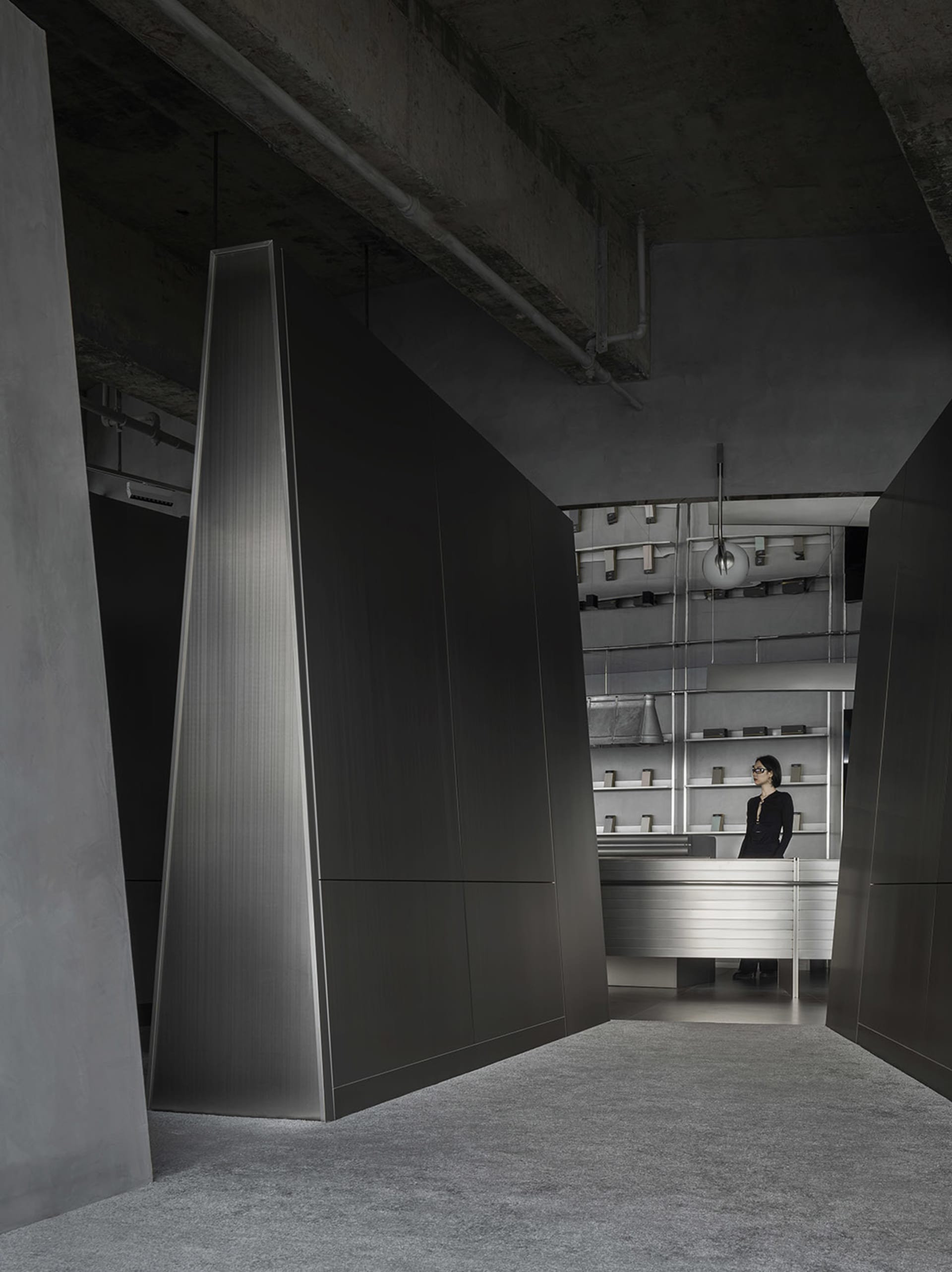 Interior design featuring metallic finishes and concrete elements