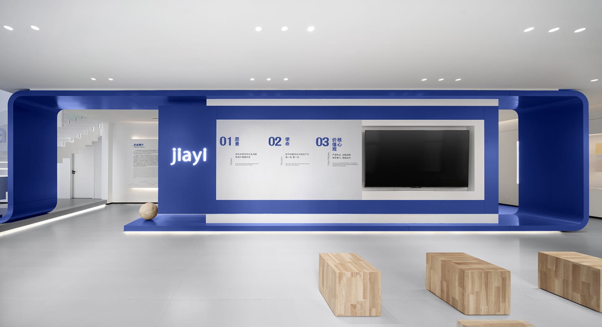 Modern minimalist office space with blue acrylic elements.