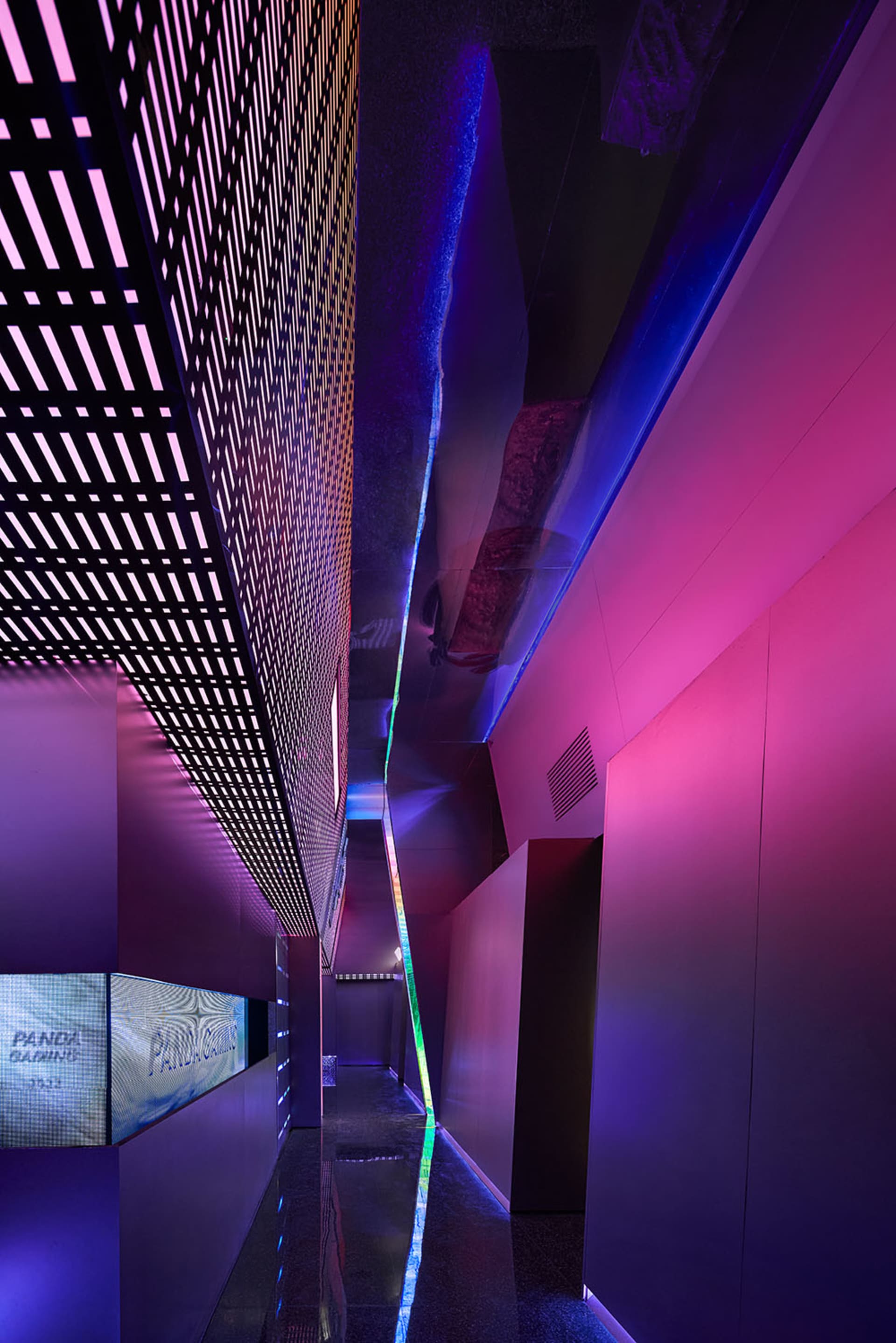 Modern interior design with metallic elements and neon lighting effects