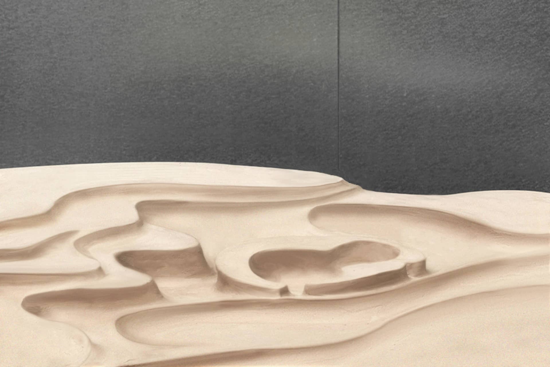 Abstract sculpture of ripples and curves formed in beige sand against a black background, resembling natural formations.