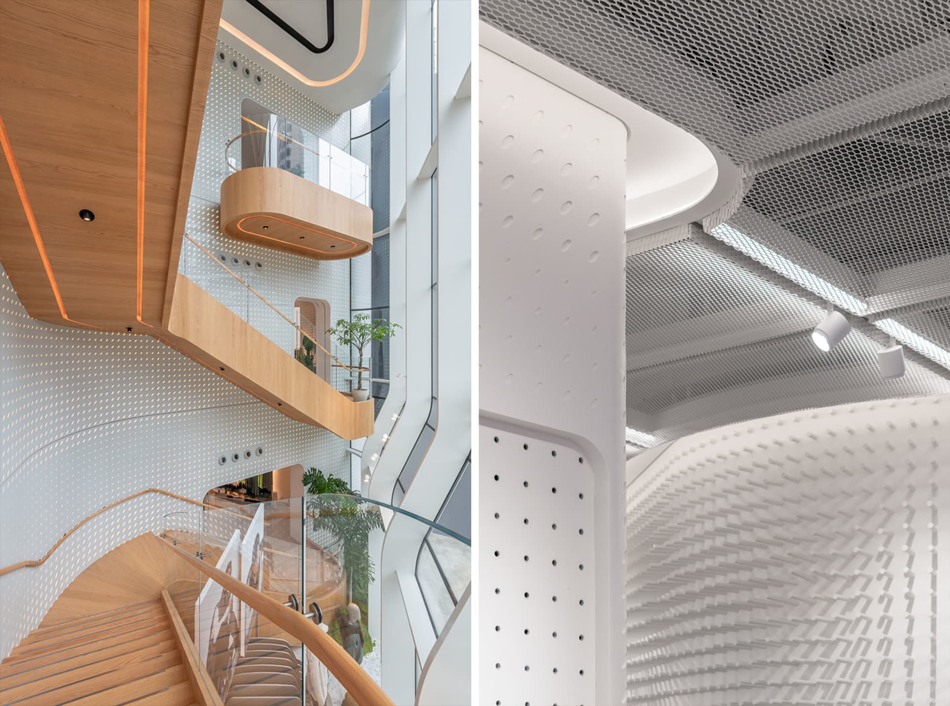 Modern building interior with a wooden staircase and perforated panels.