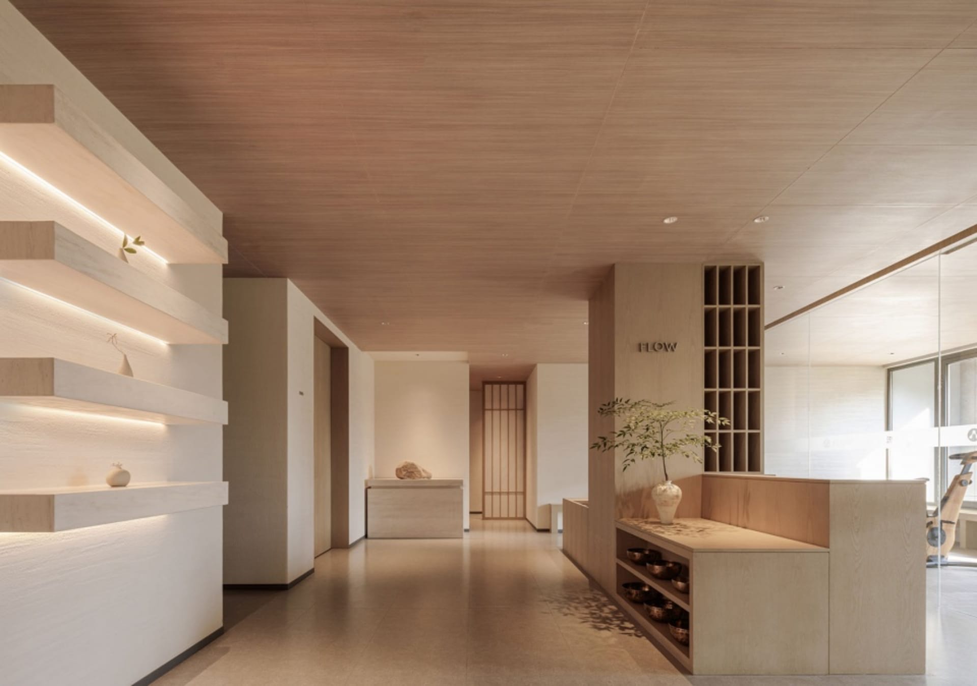 A minimalist spa reception desk made of wood.