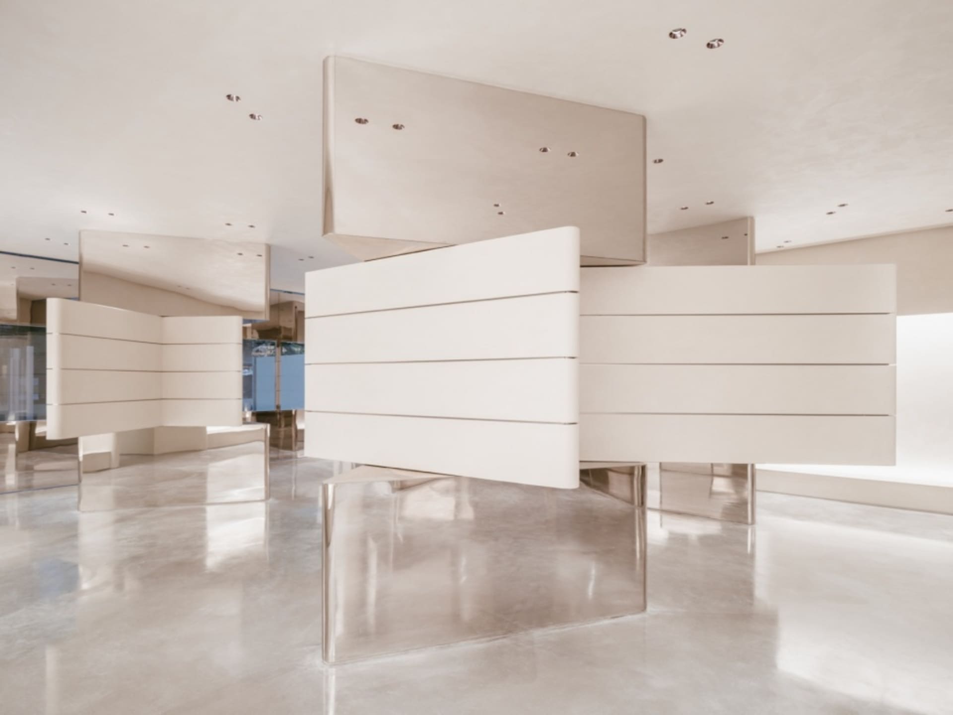A minimalist, modern interior design featuring sleek, metallic panels.