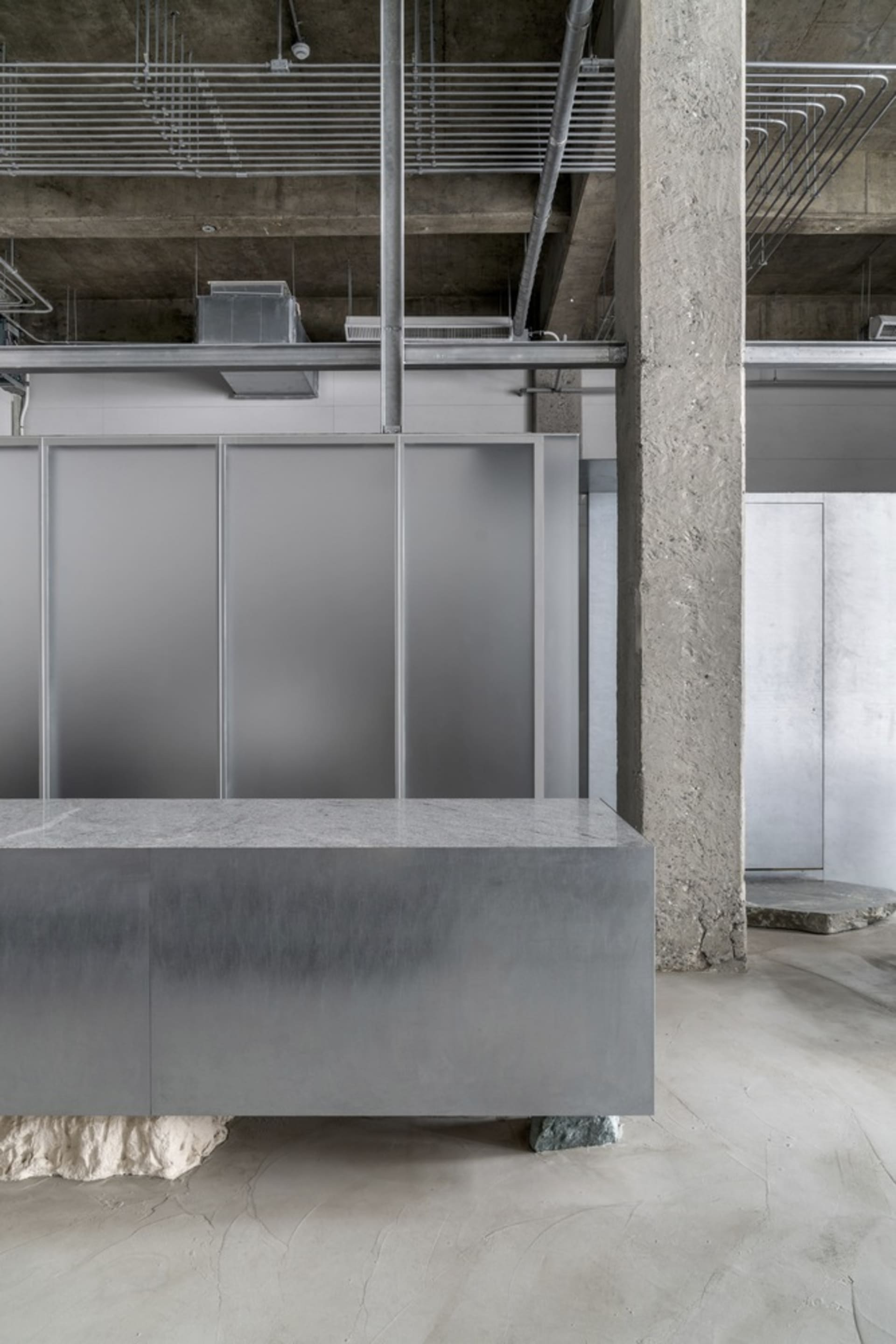 Concrete floor and walls in an industrial office space