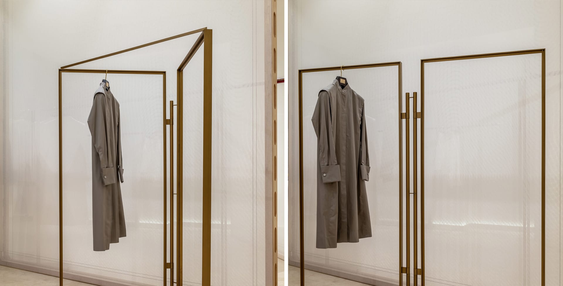 Modern interior design featuring a metal-framed clothing display