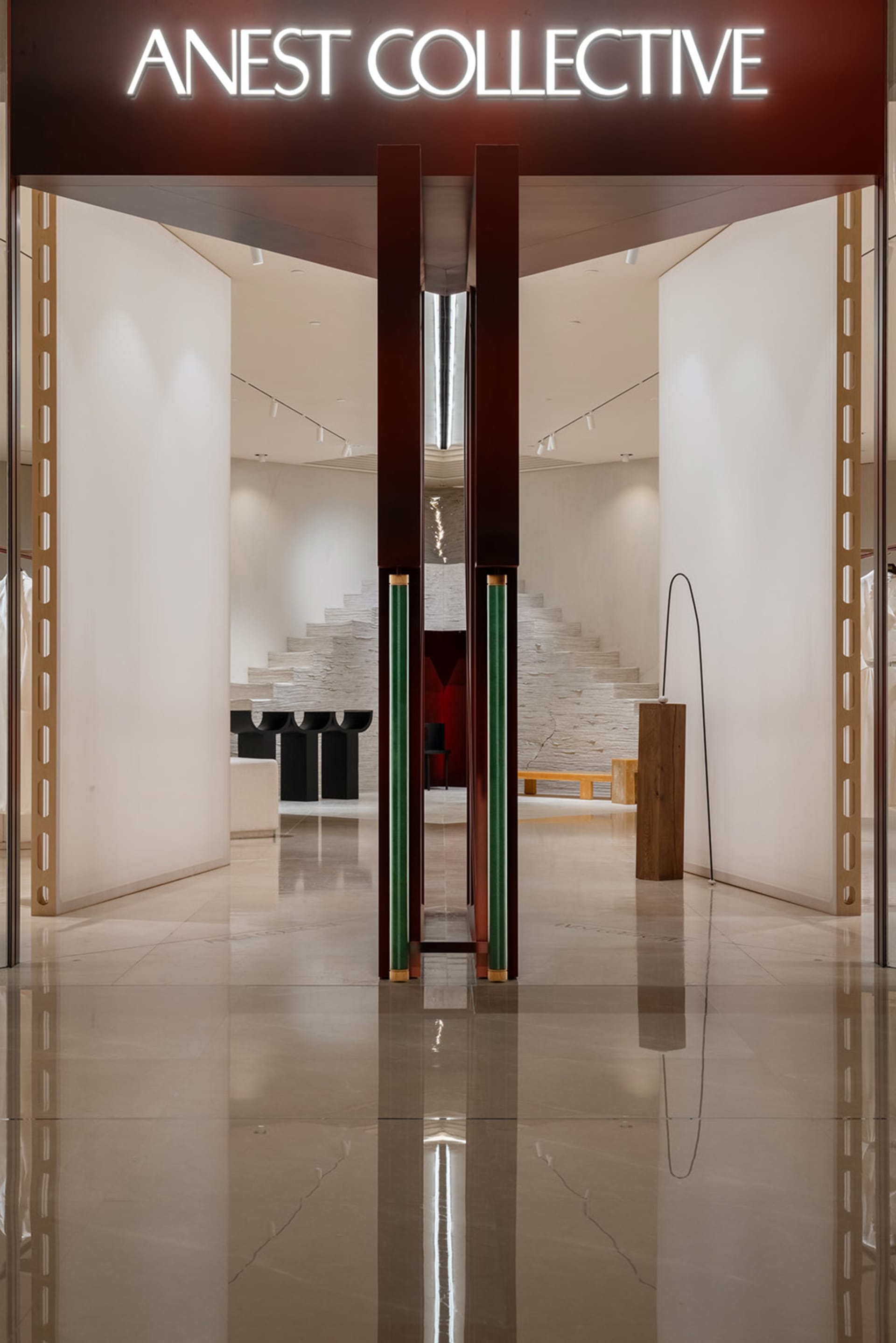 An elegant modern retail space featuring black columns.