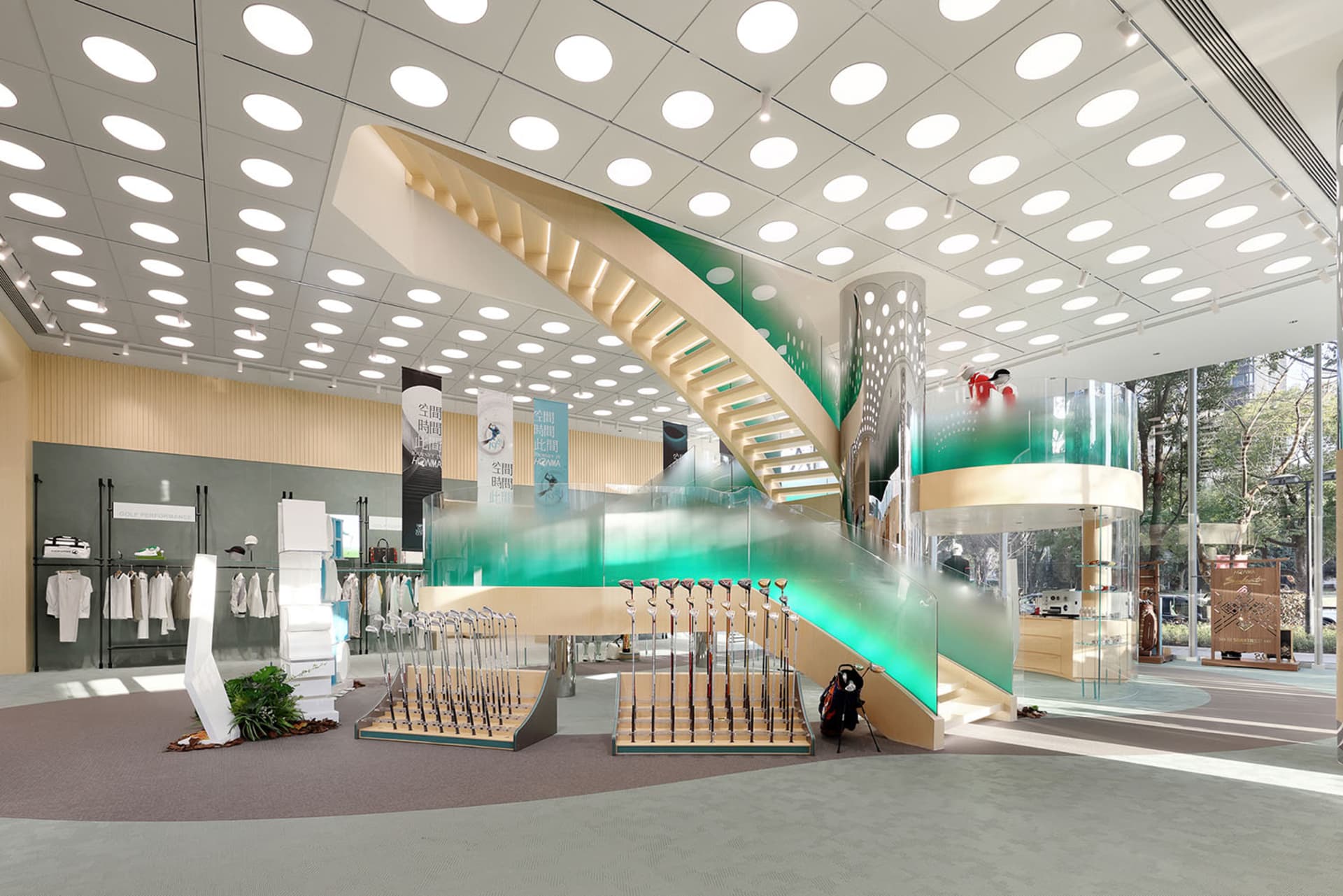 A modern retail store featuring glass, wood, and metal materials.