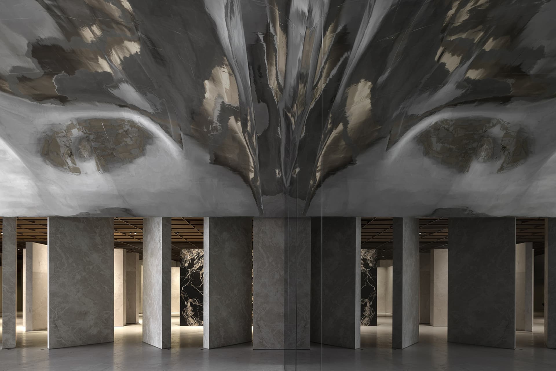 A modern interior space featuring concrete walls and marble columns.