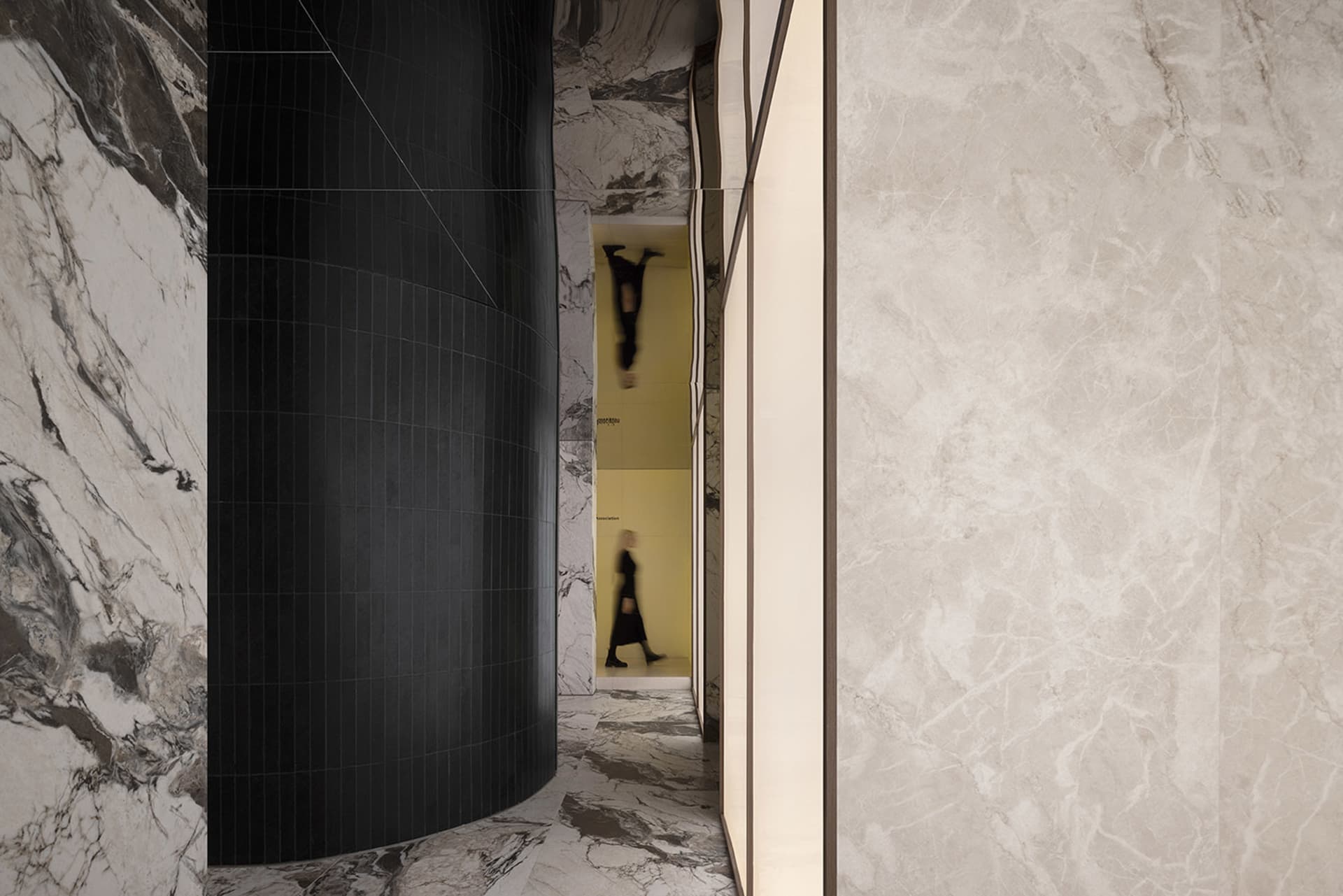 Modern interior design featuring marble material in a corridor.