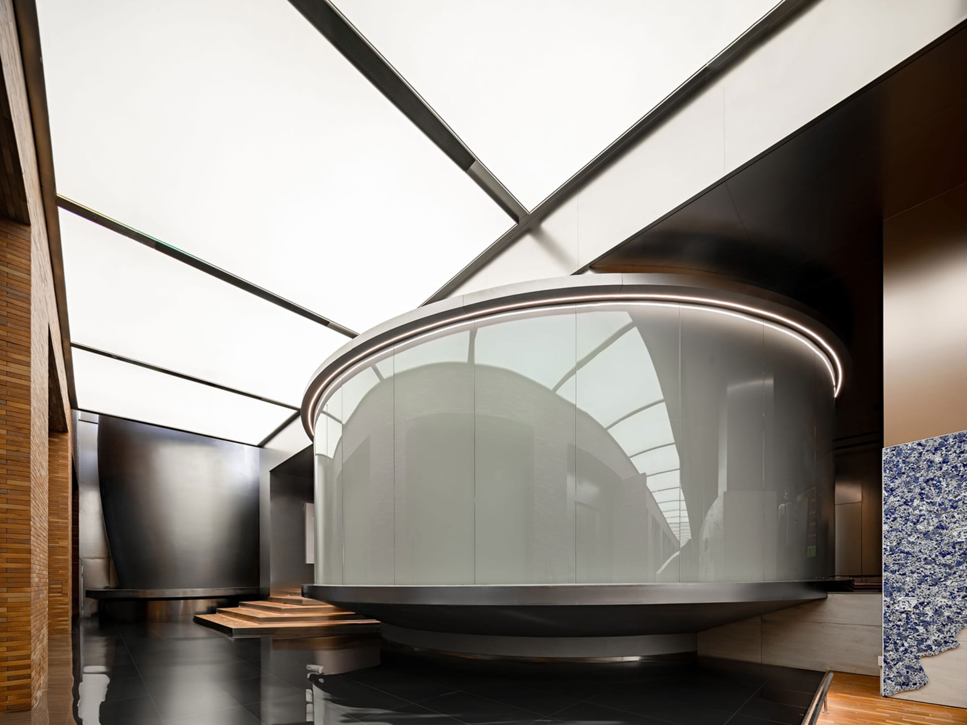 Modern office space featuring glass walls