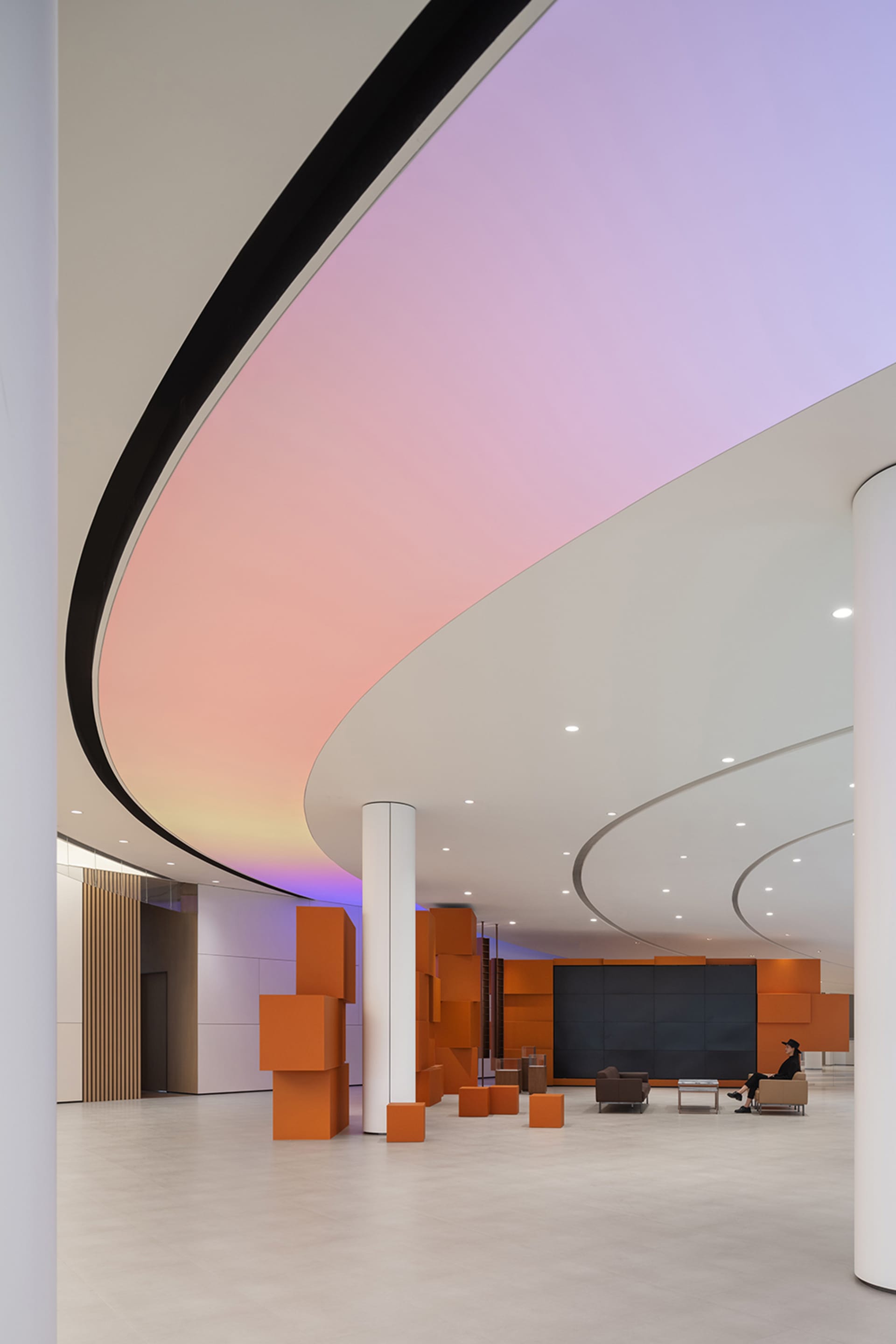 Modern lobby featuring glass and concrete elements