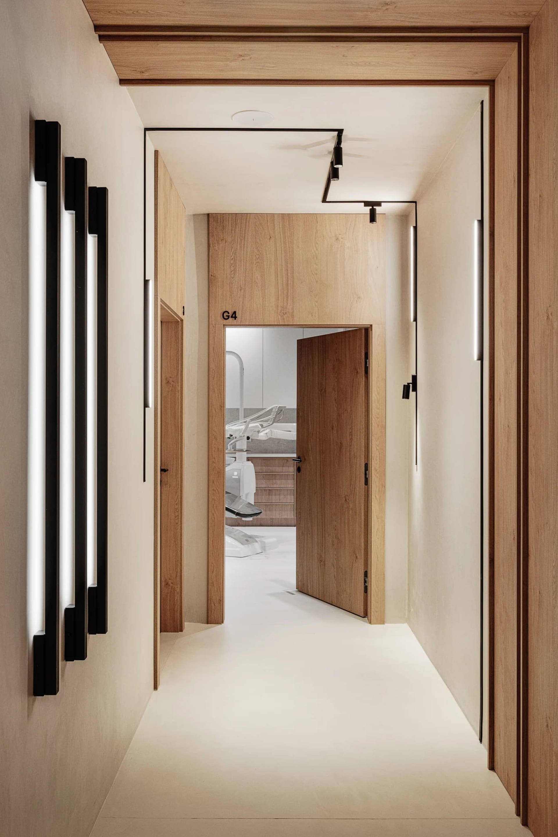 A minimalist office with wooden and concrete materials.