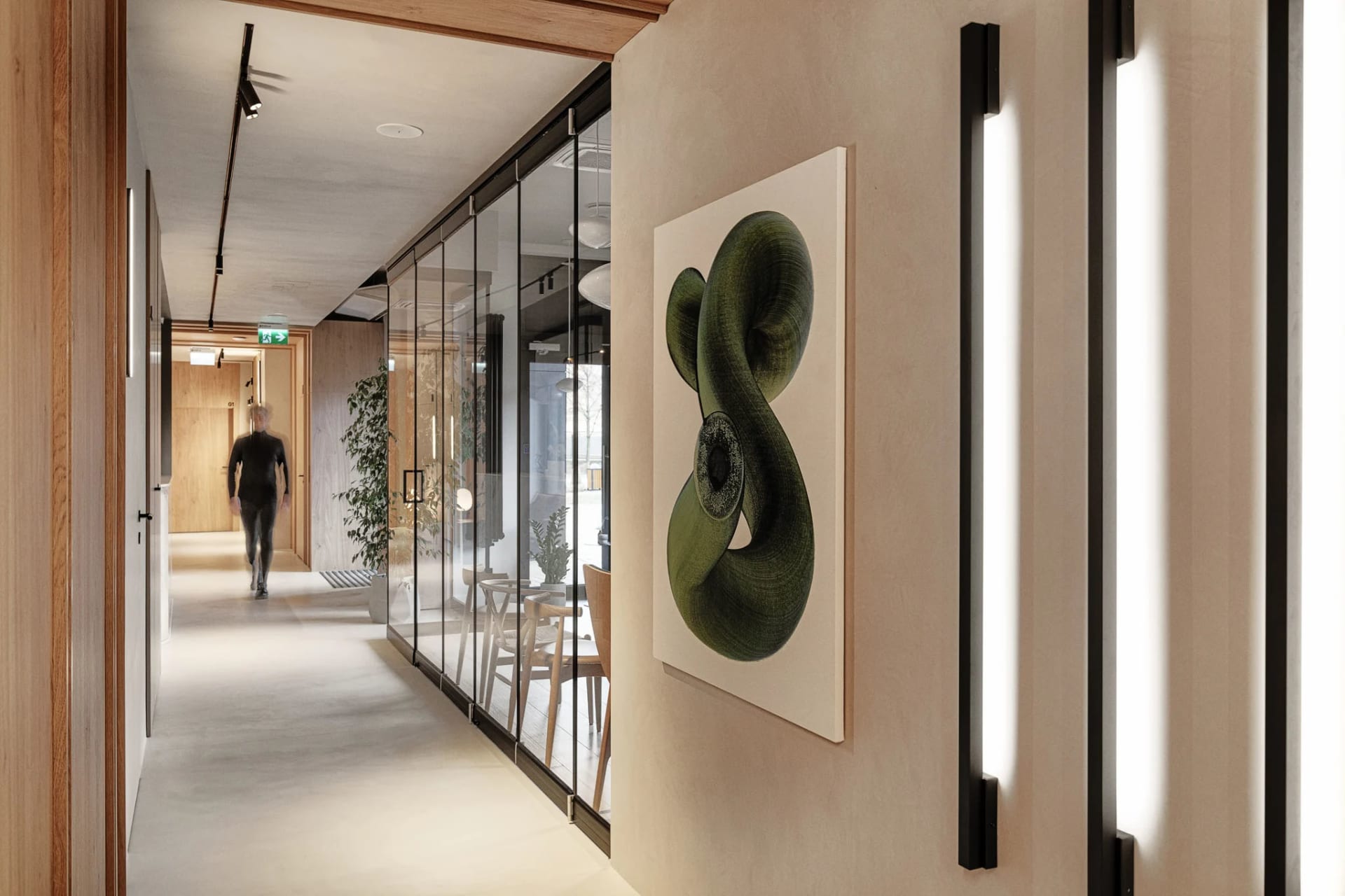 Modern office environment featuring wooden accents and contemporary design elements.