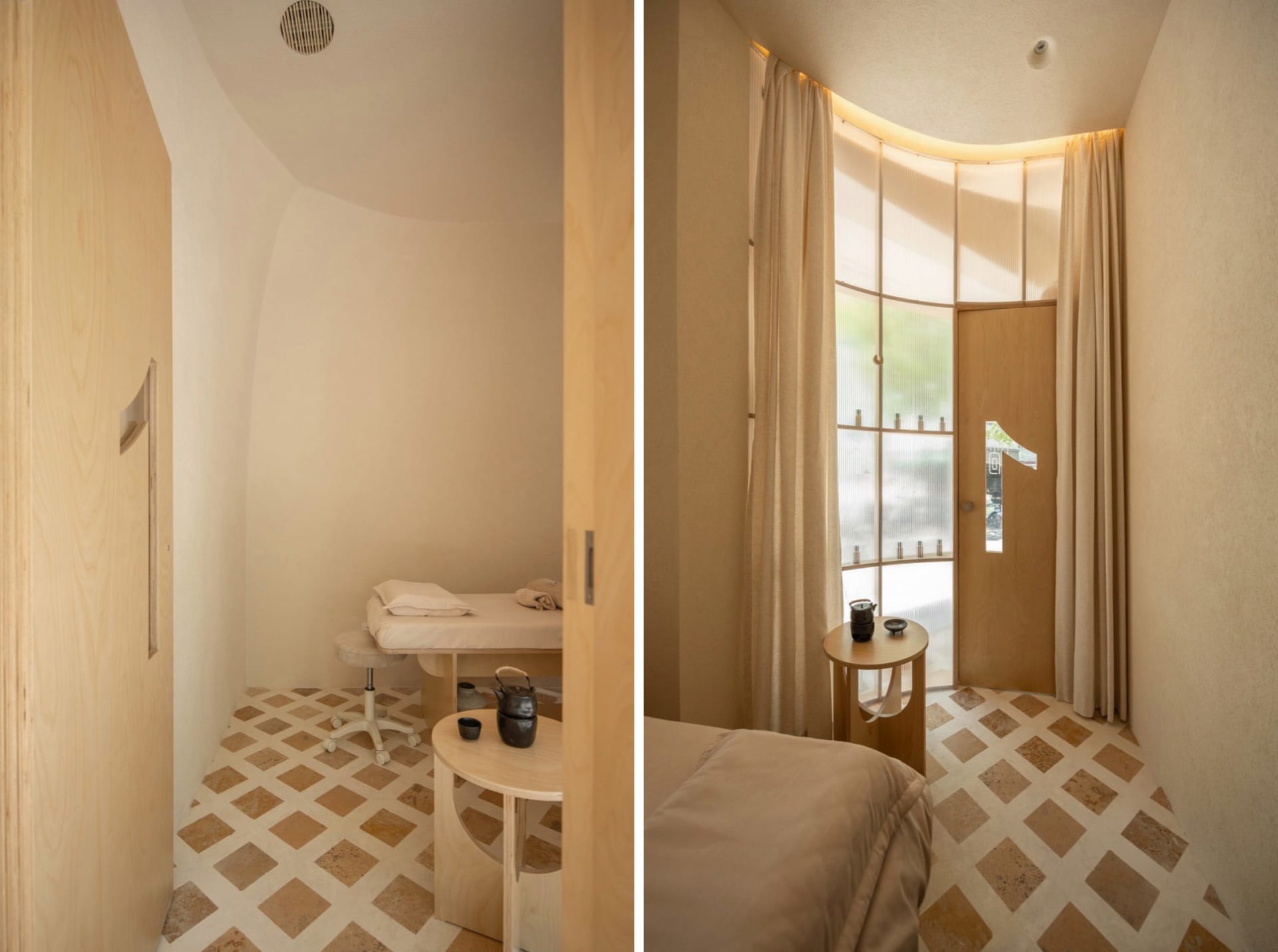 A modern hotel suite featuring wooden furniture and flooring.